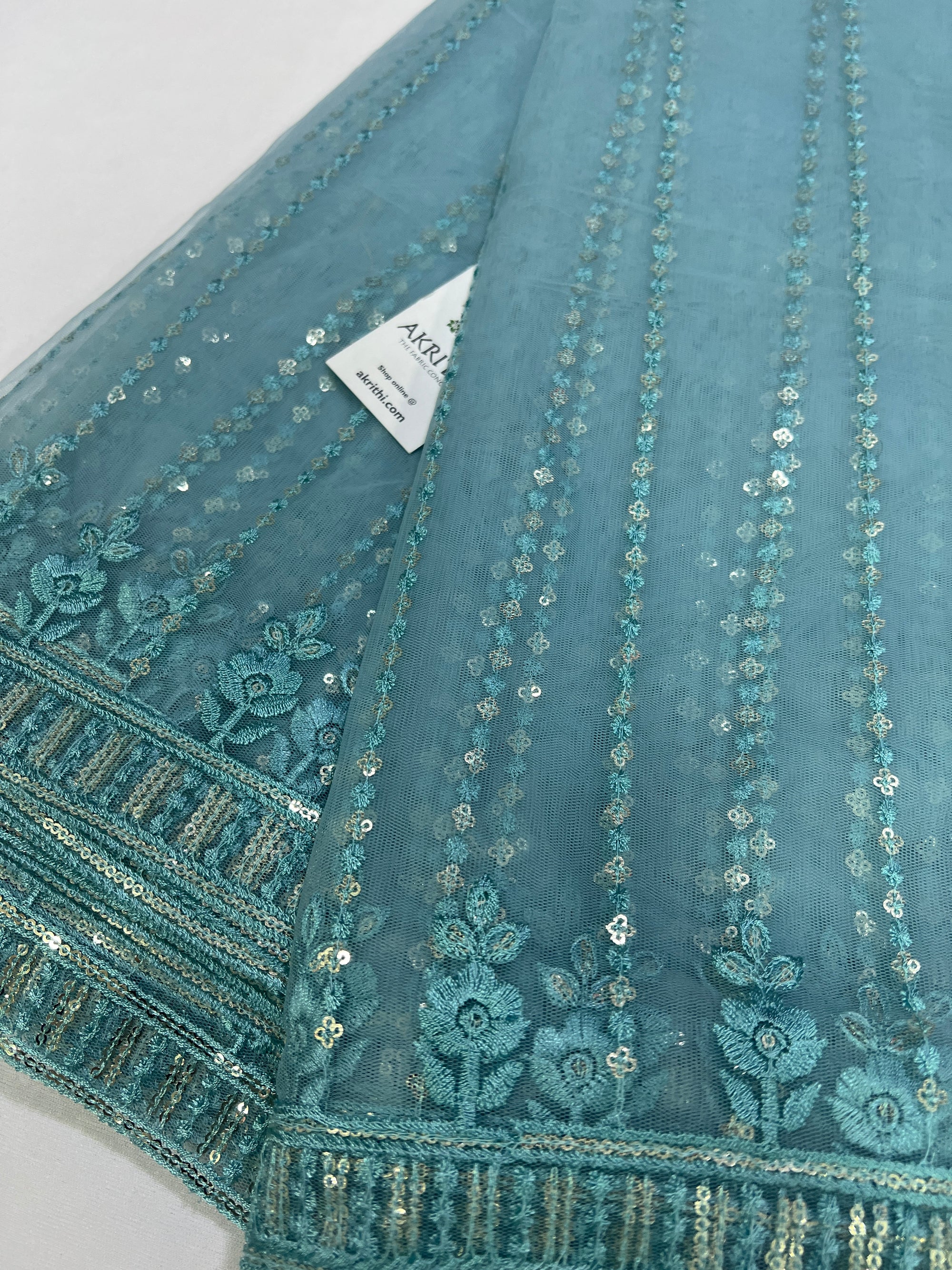Embroidery on net fabric