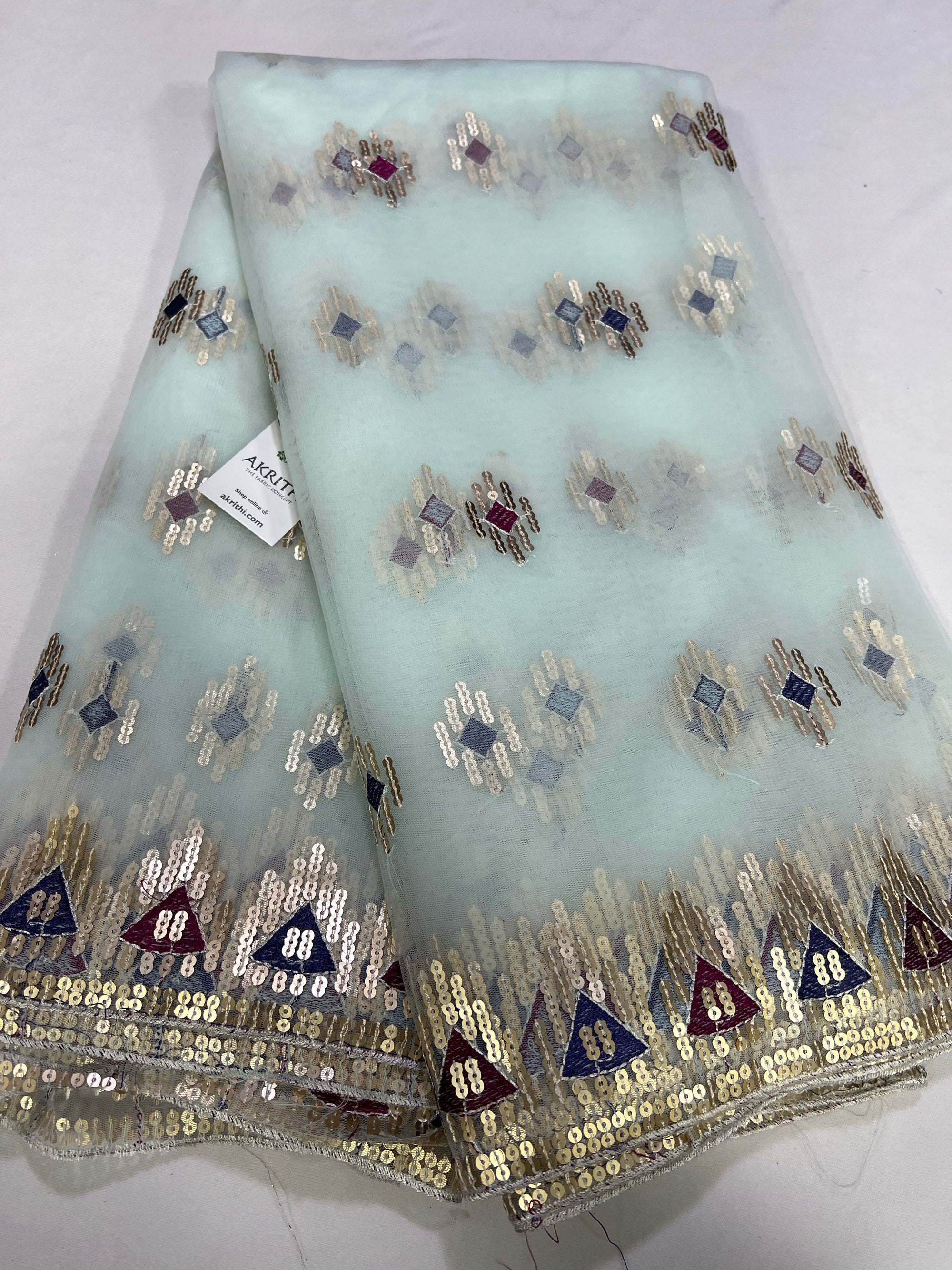 Embroidery on net fabric