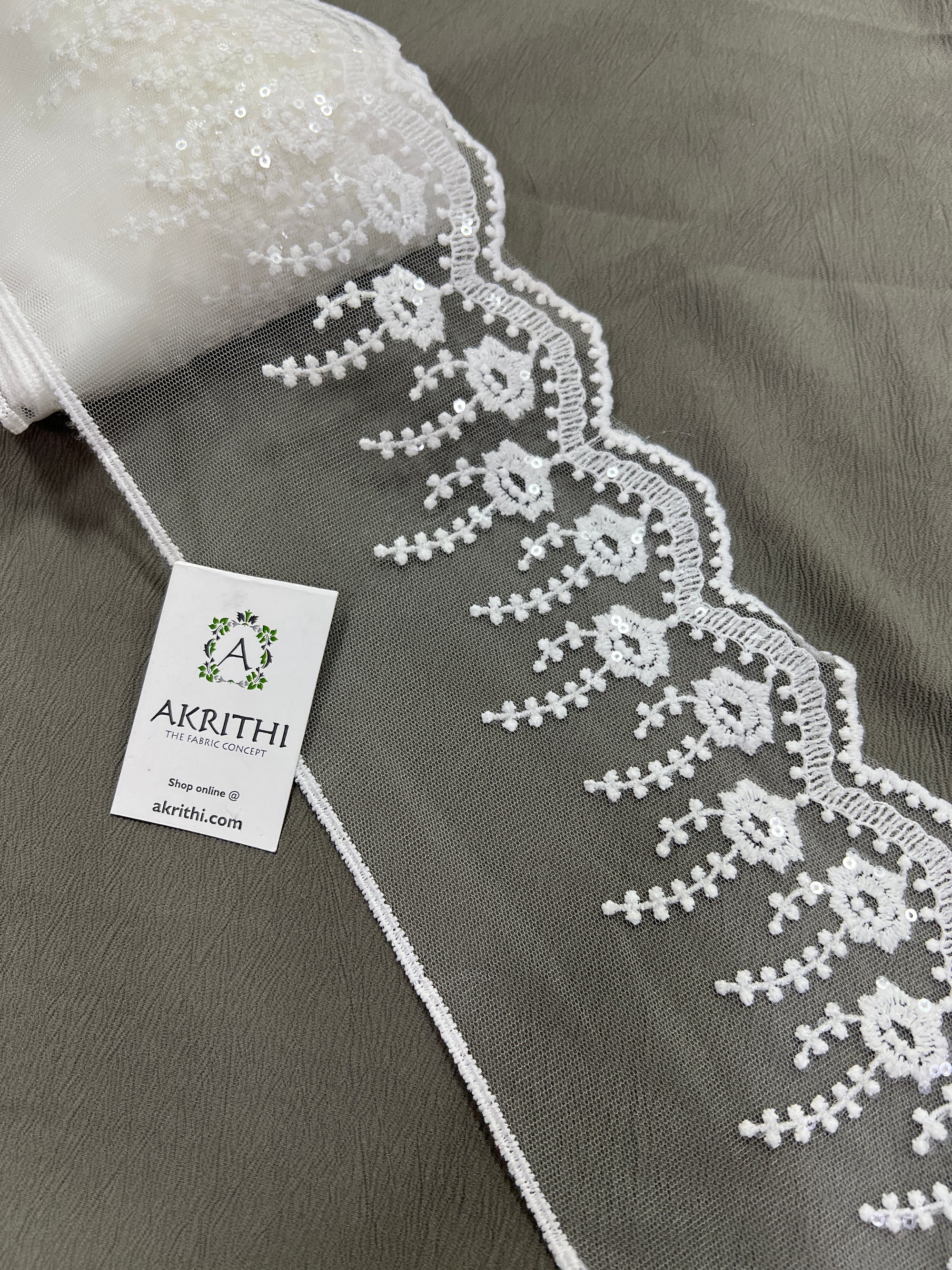 Embroidered white net lace 9 metres roll
