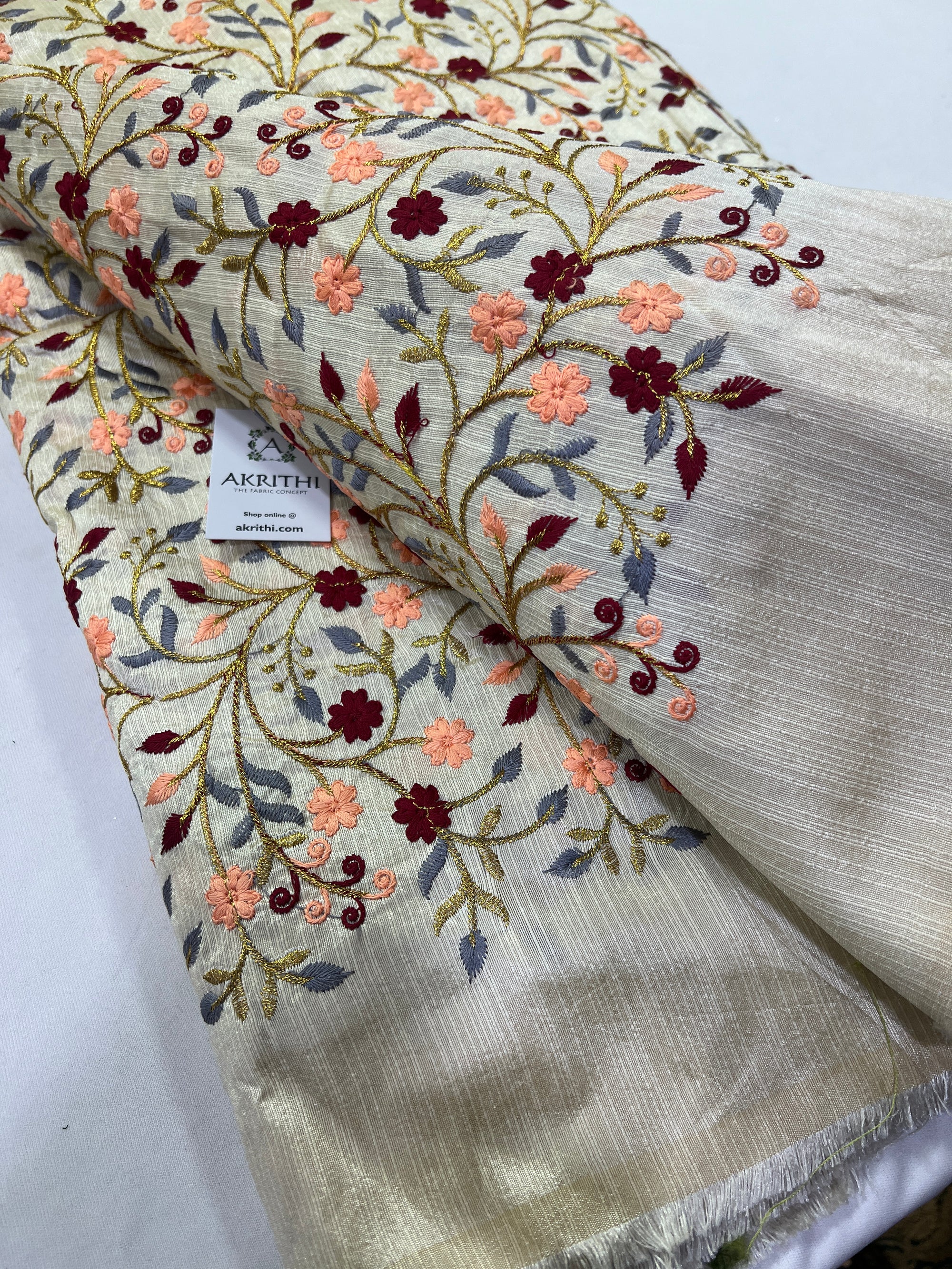 Embroidery on raw silk fabric
