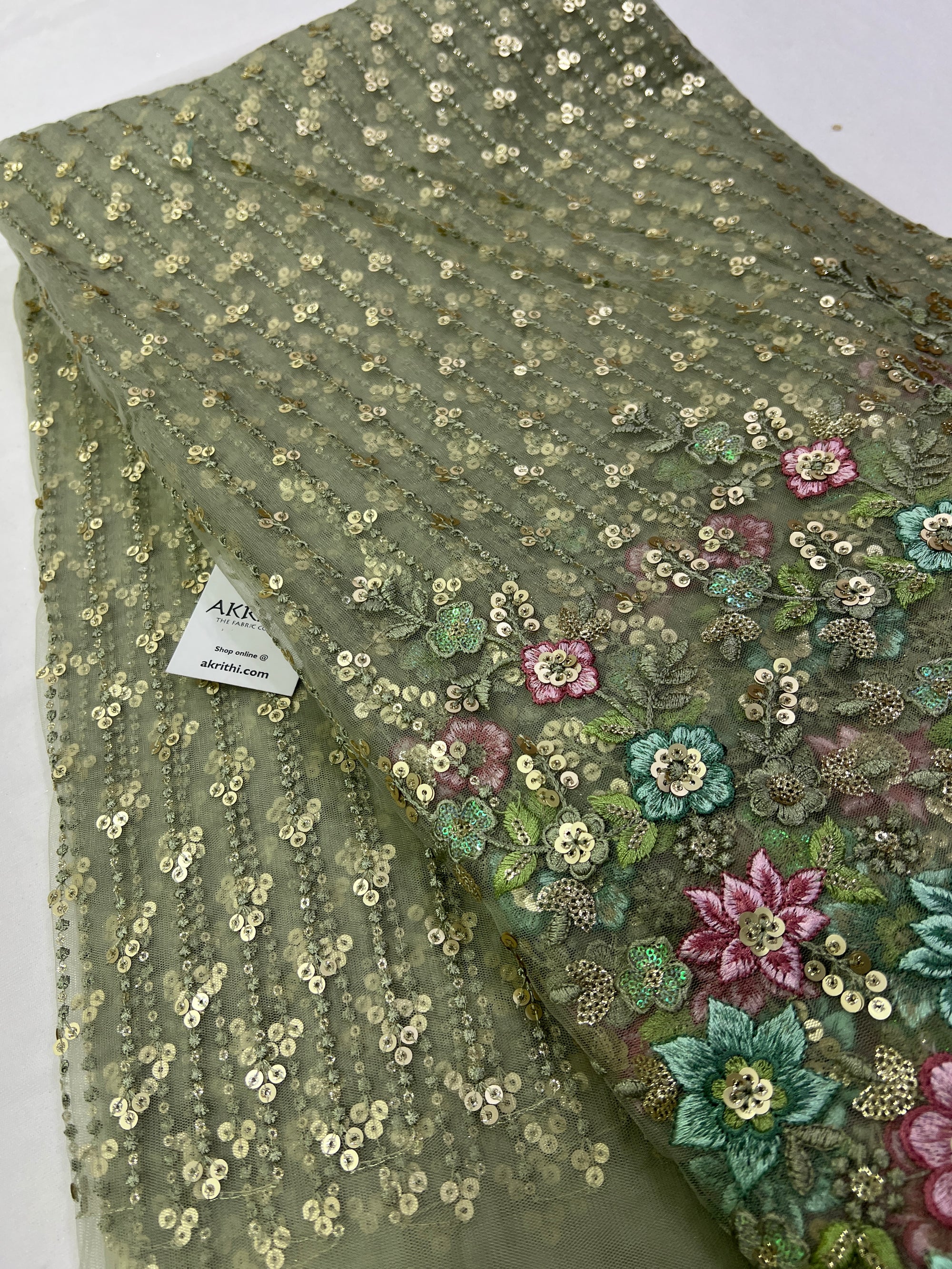 Embroidery on net fabric