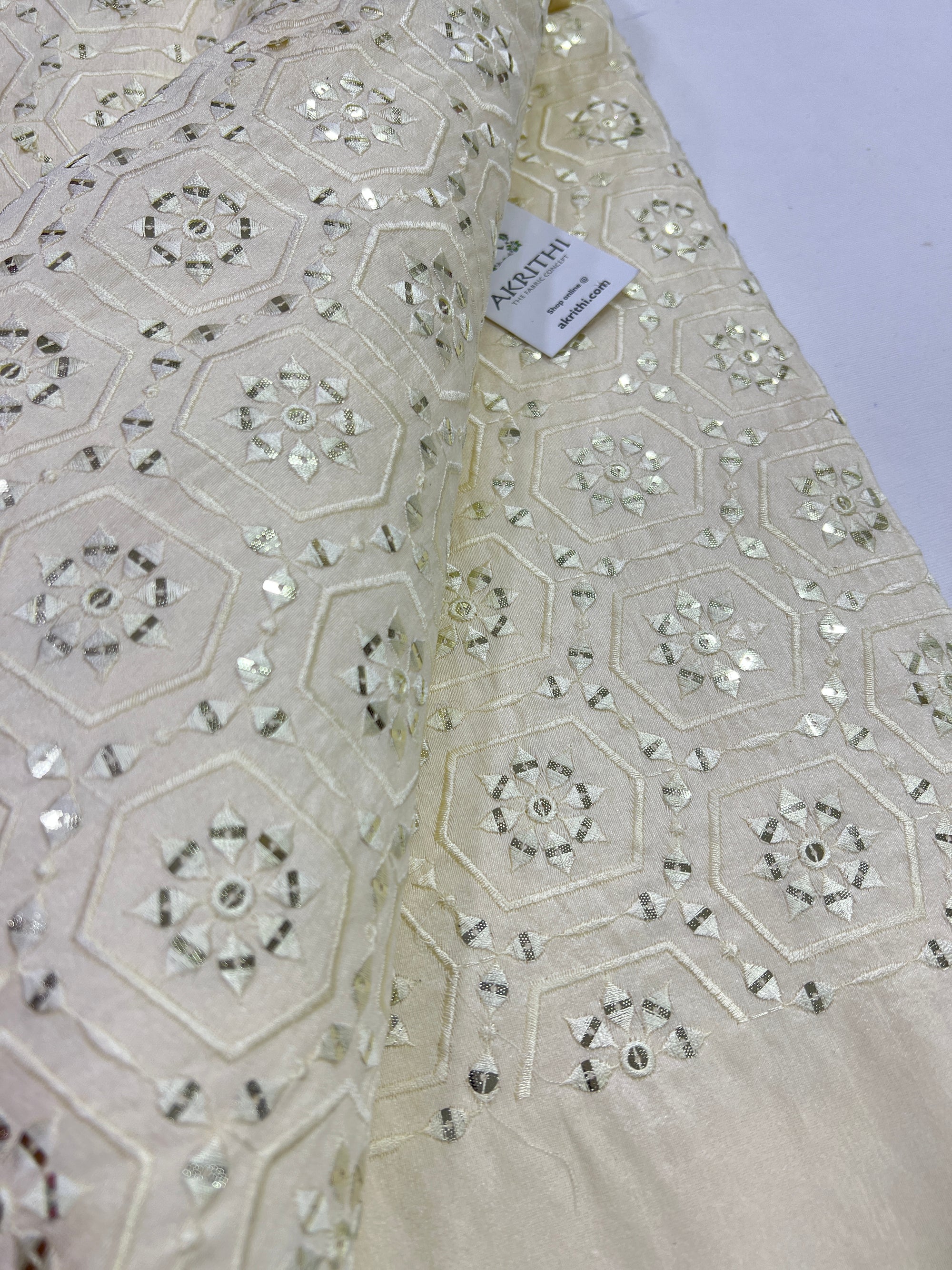 Embroidery on raw silk fabric