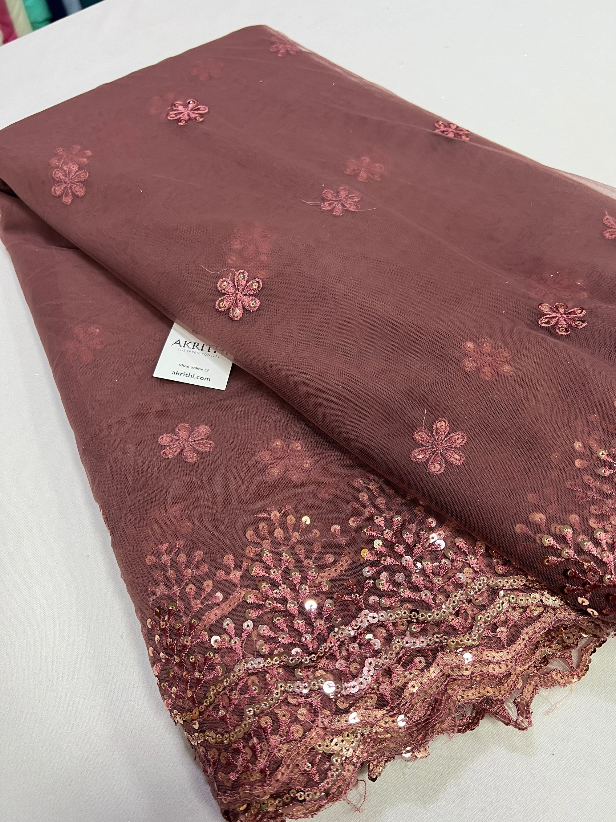 Embroidery on net fabric