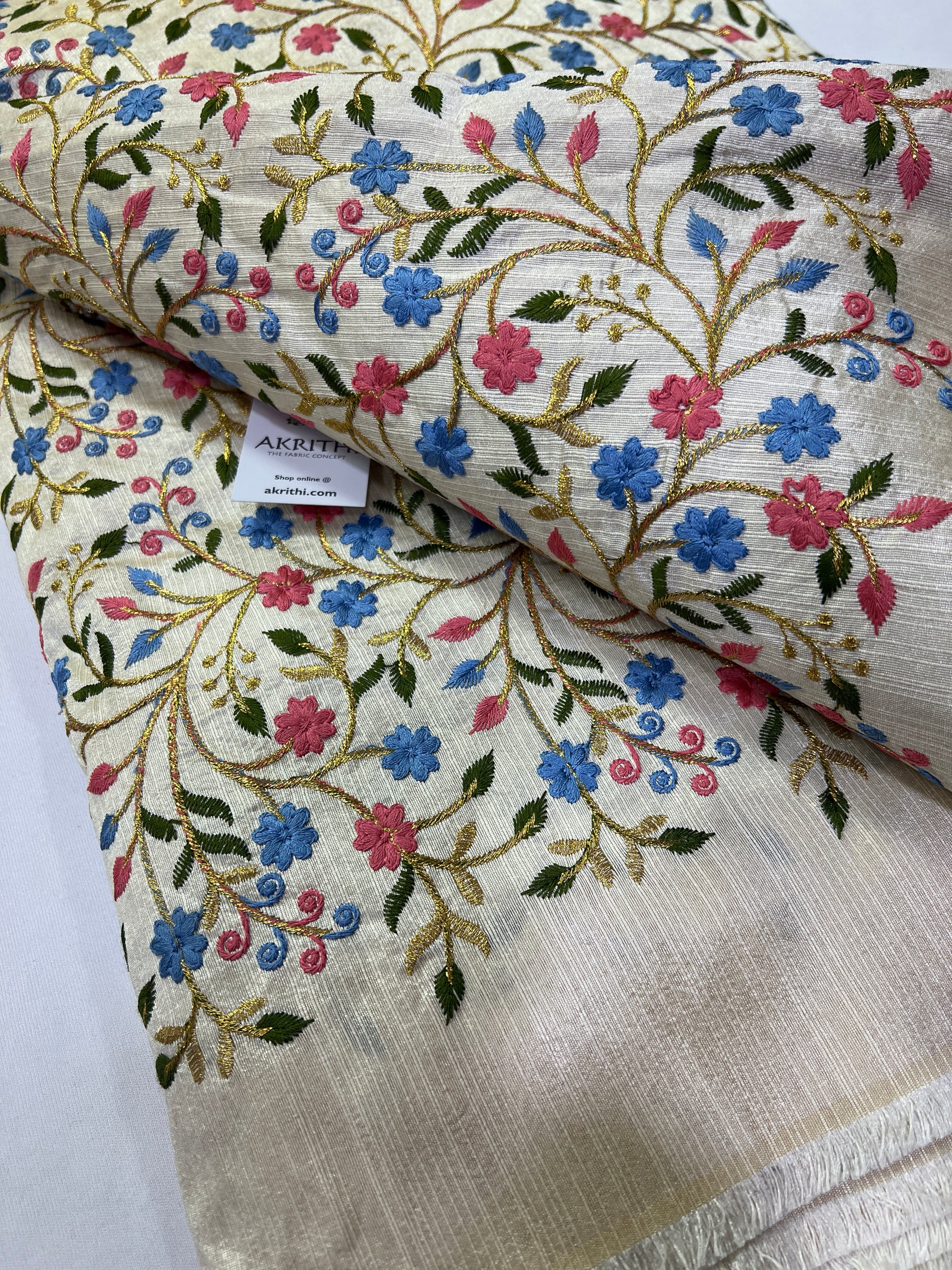 Embroidery on raw silk fabric