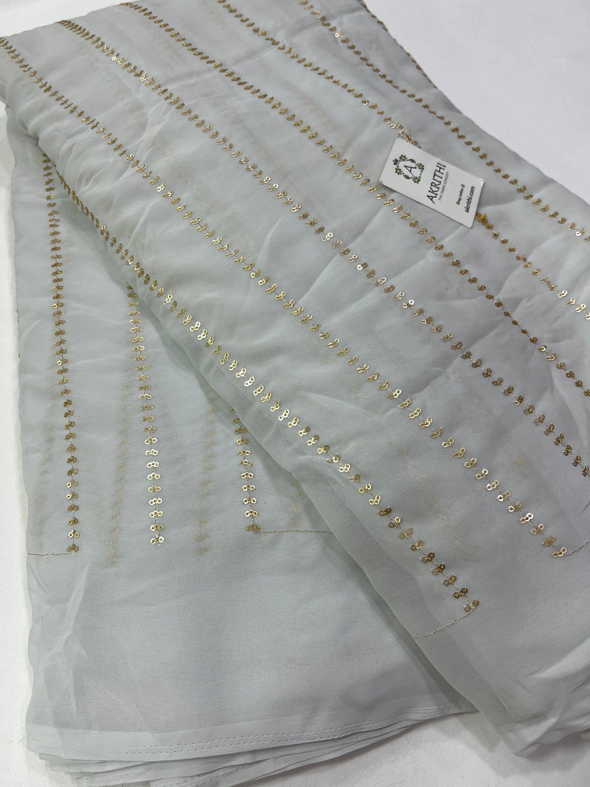 Embroidery on Light grey Georgette fabric 60 CM CUT