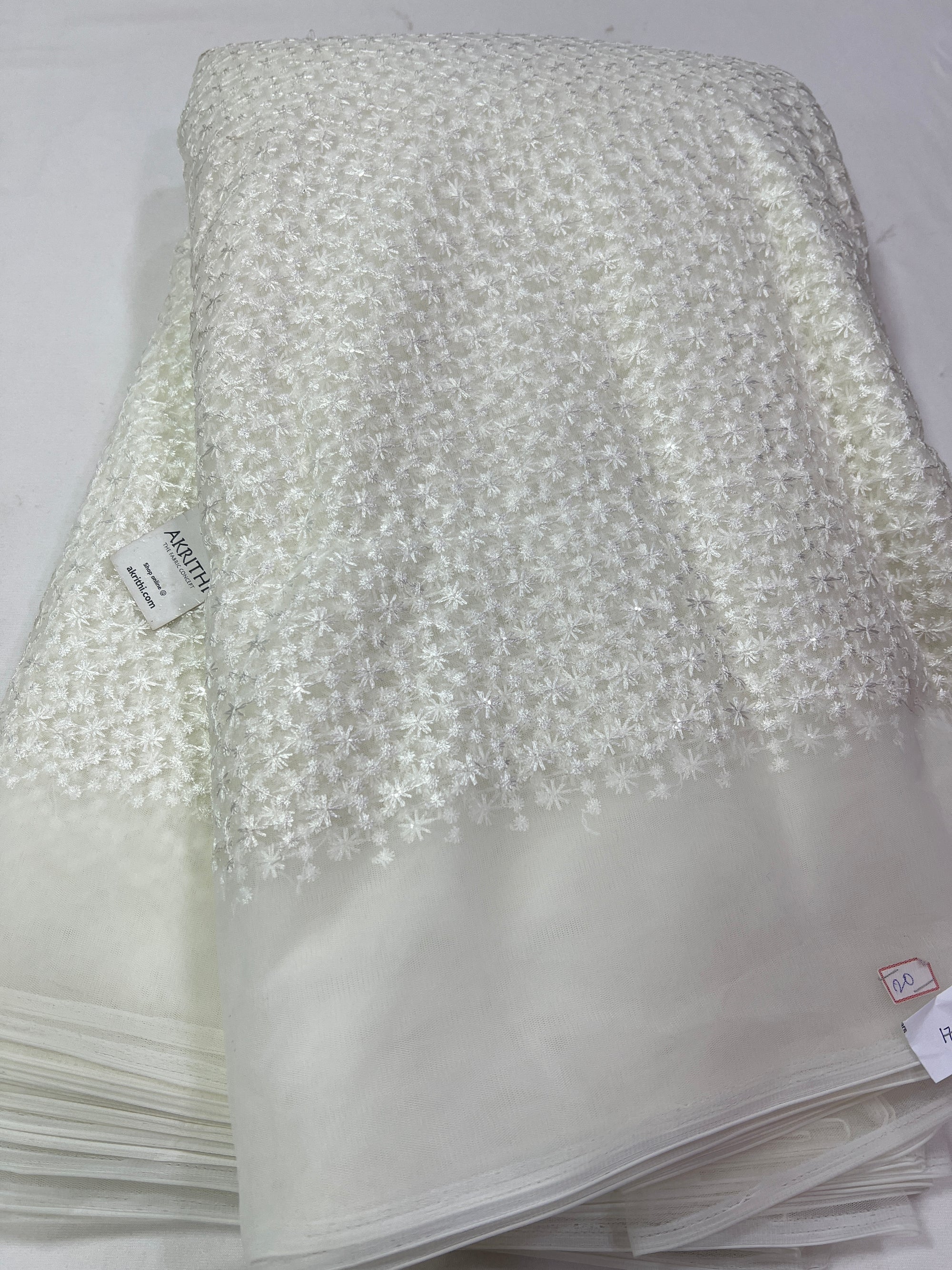 Embroidery on net fabric