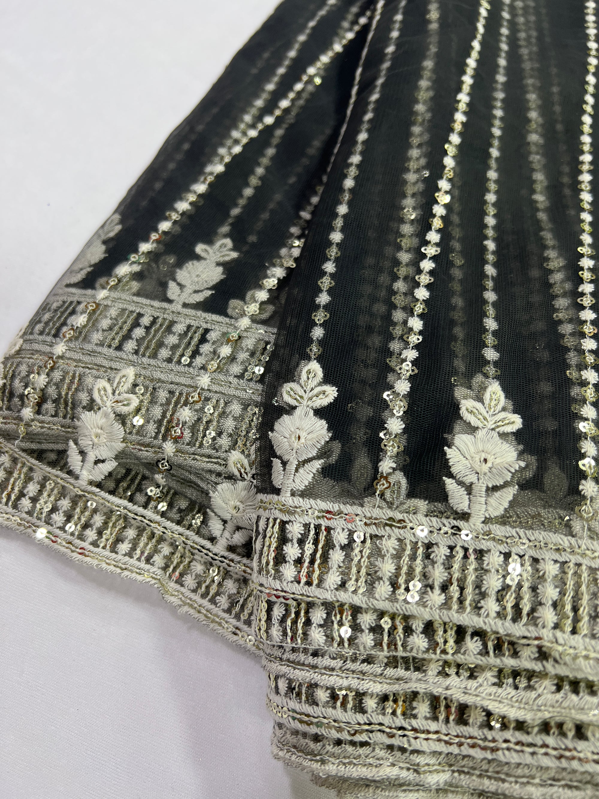 Embroidery on net fabric