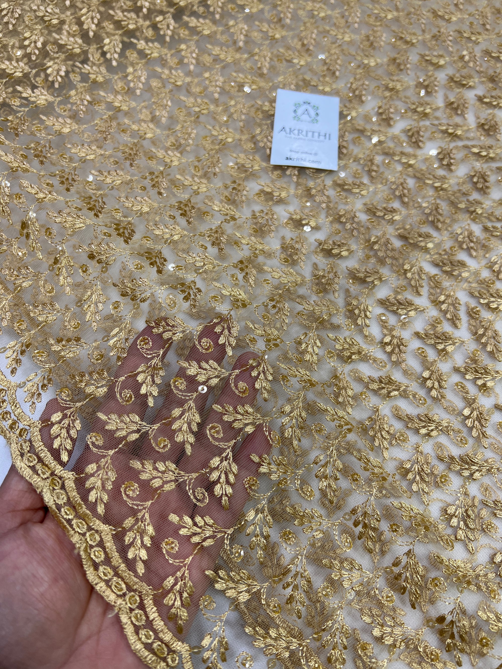 Embroidery on net fabric