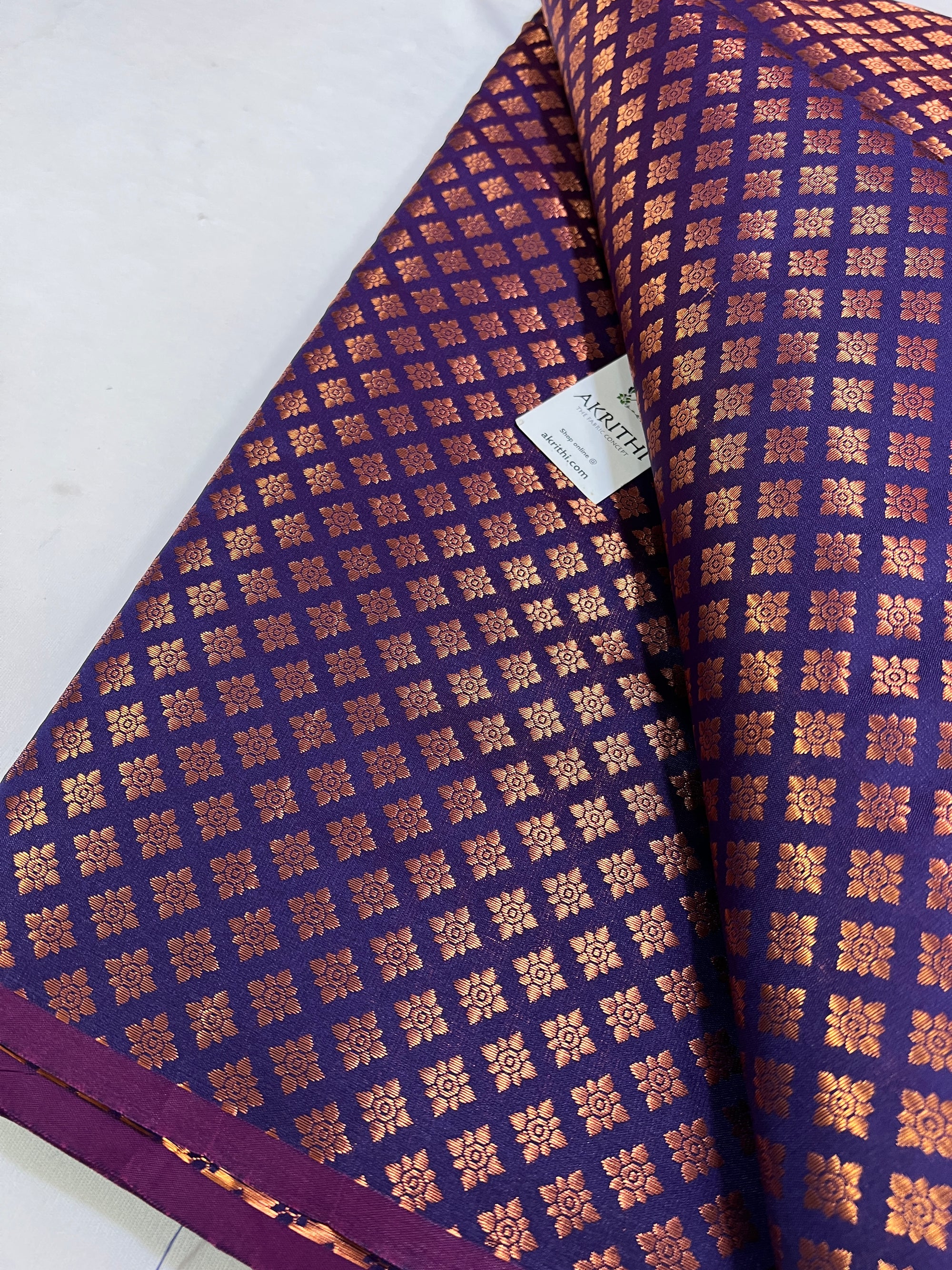 Banarasi brocade fabric with copper zari