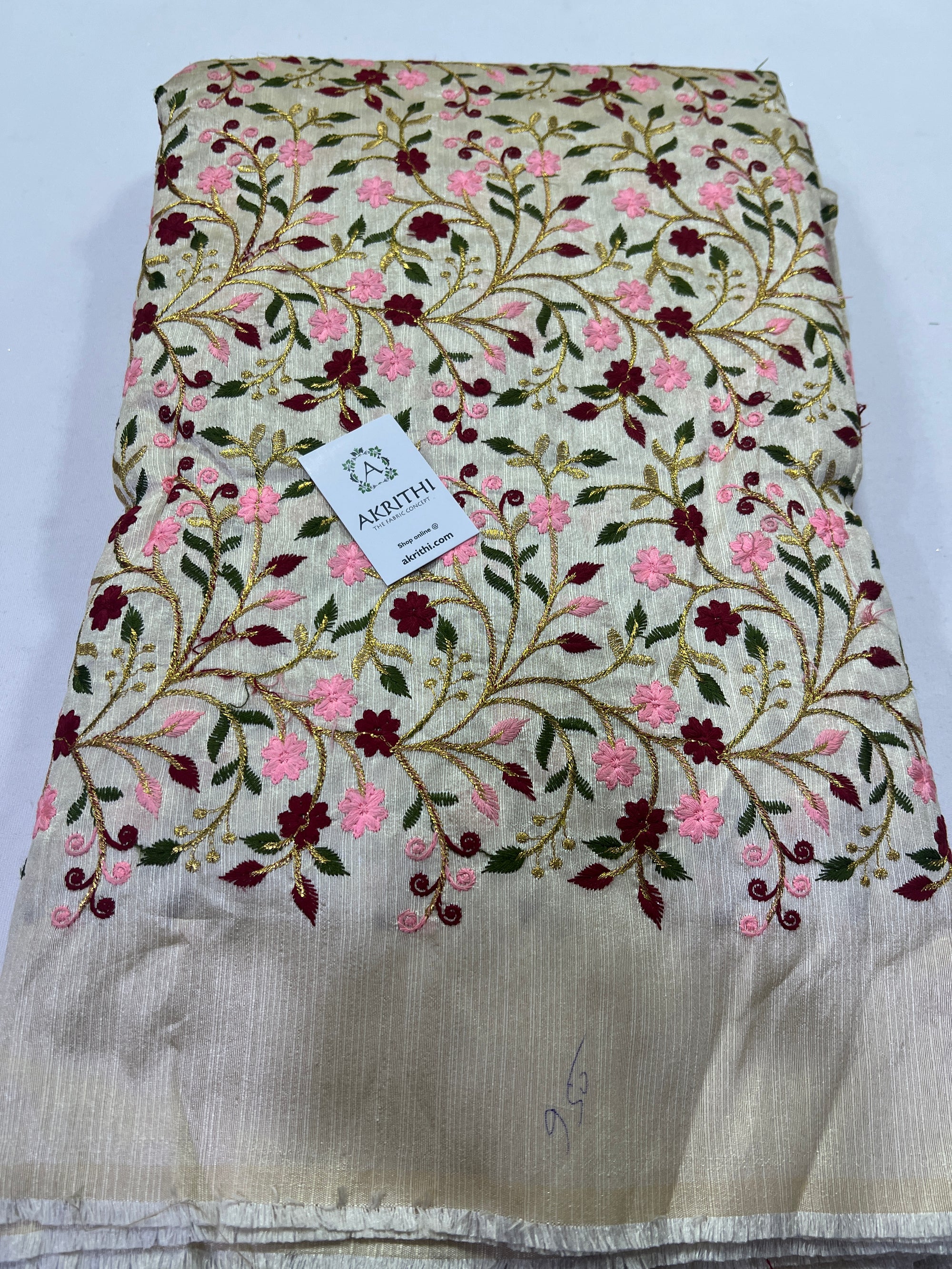 Embroidery on raw silk fabric