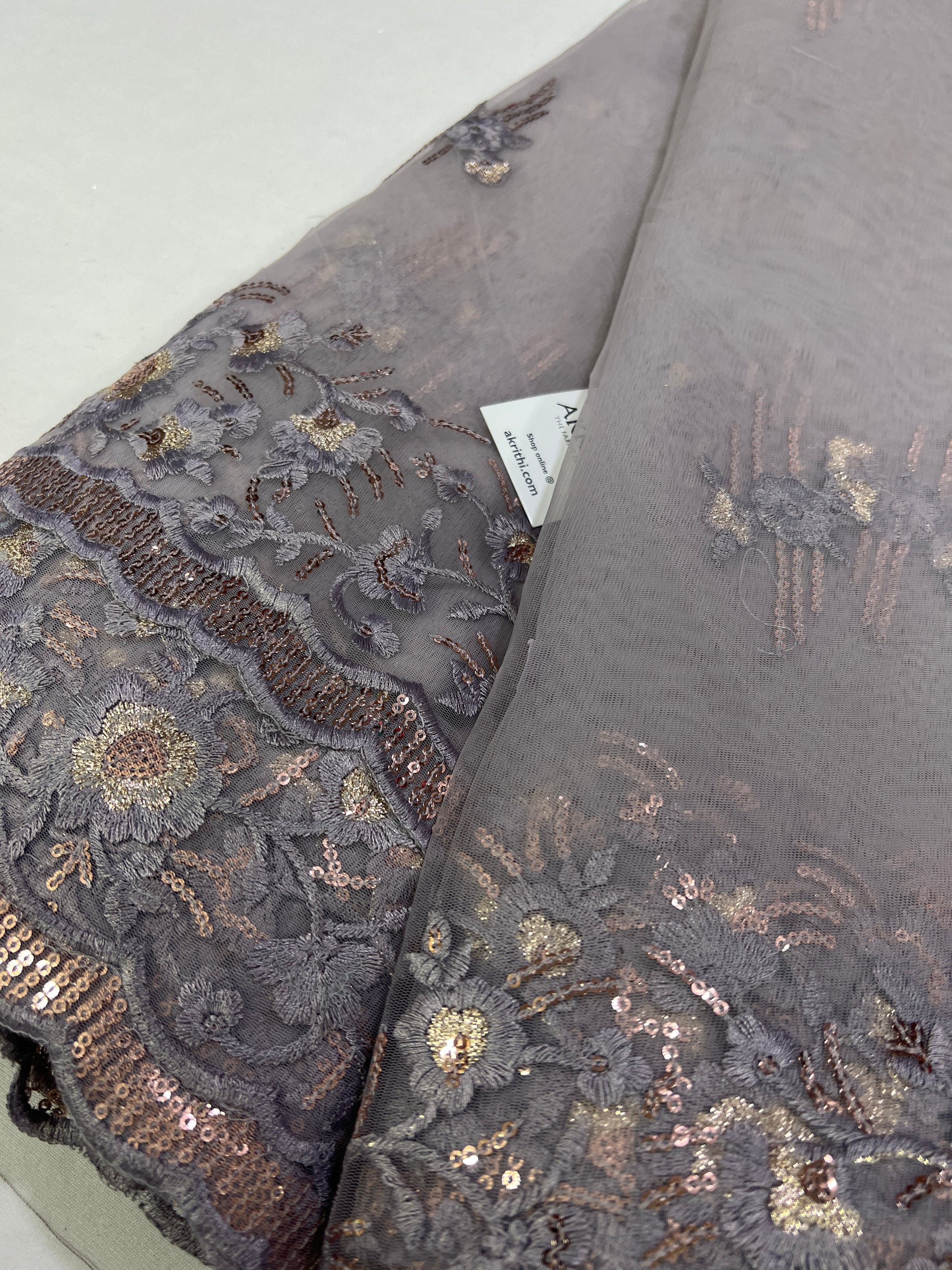 Embroidery on net fabric