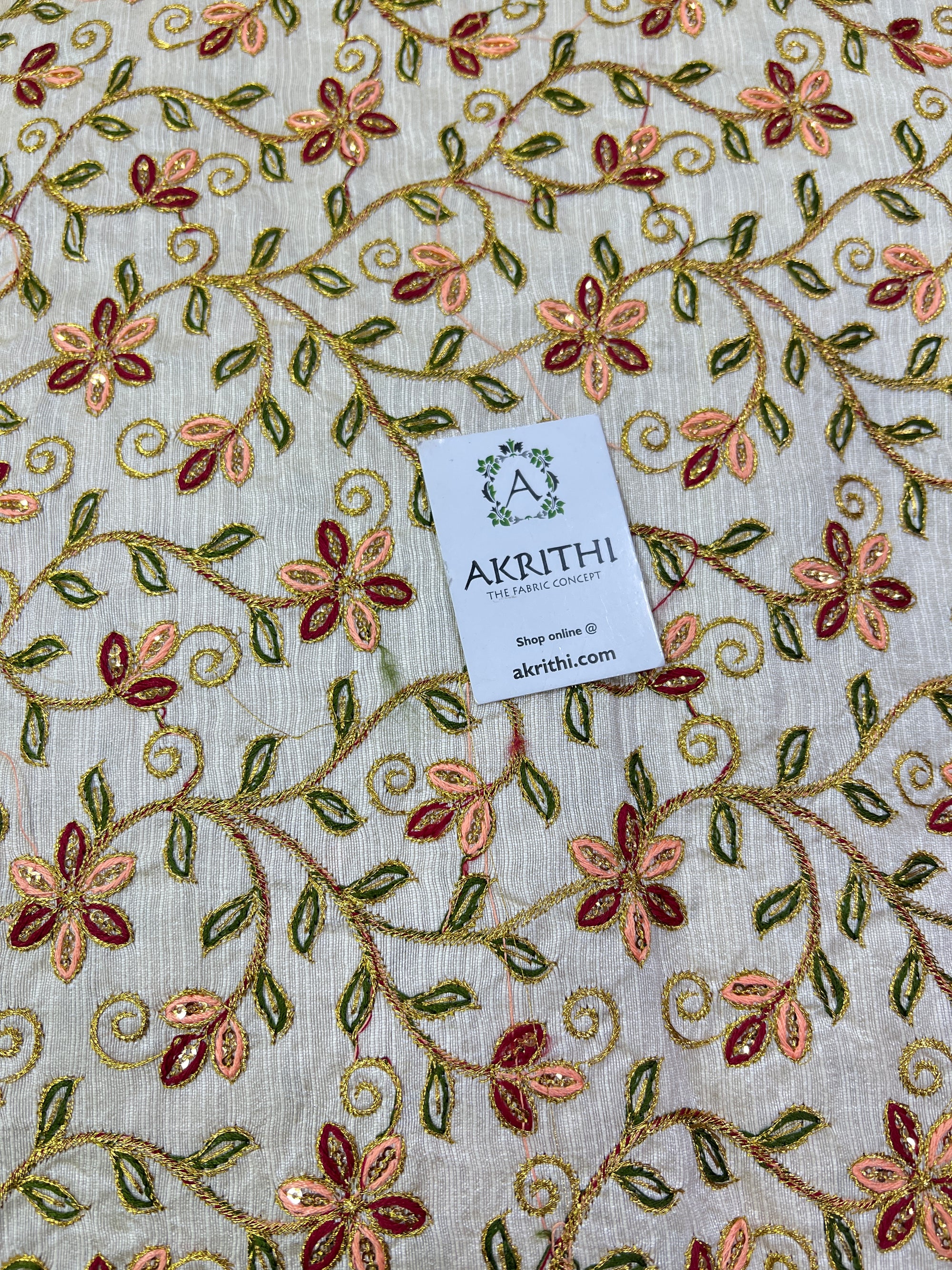 Embroidery on raw silk fabric