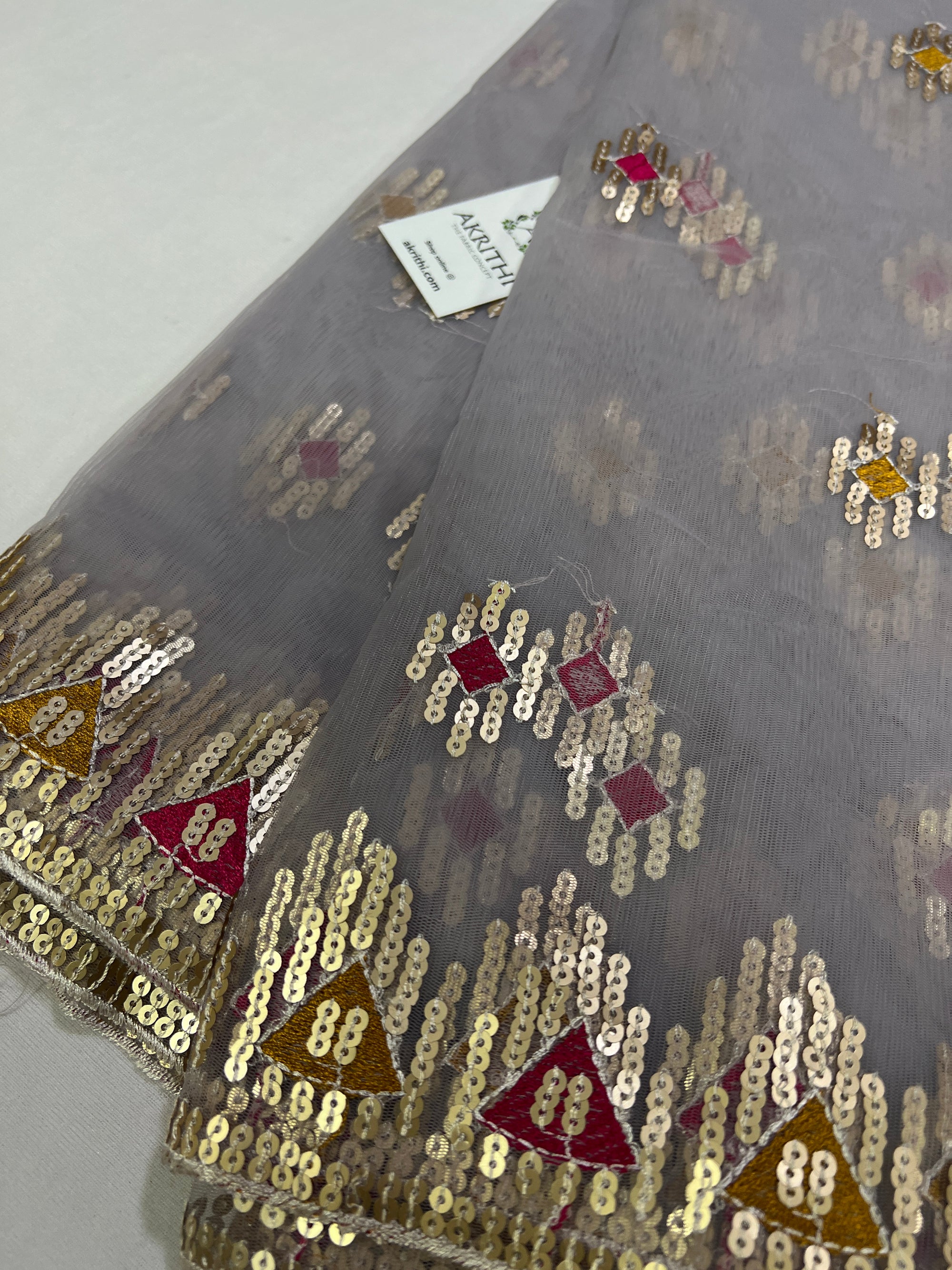 Embroidery on net fabric