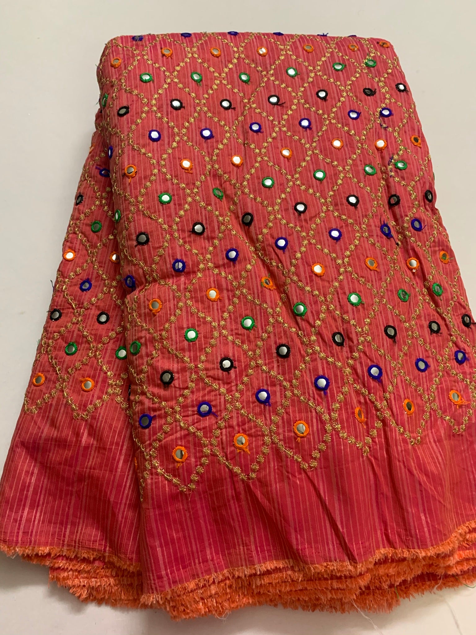 Embroidery on raw silk fabric