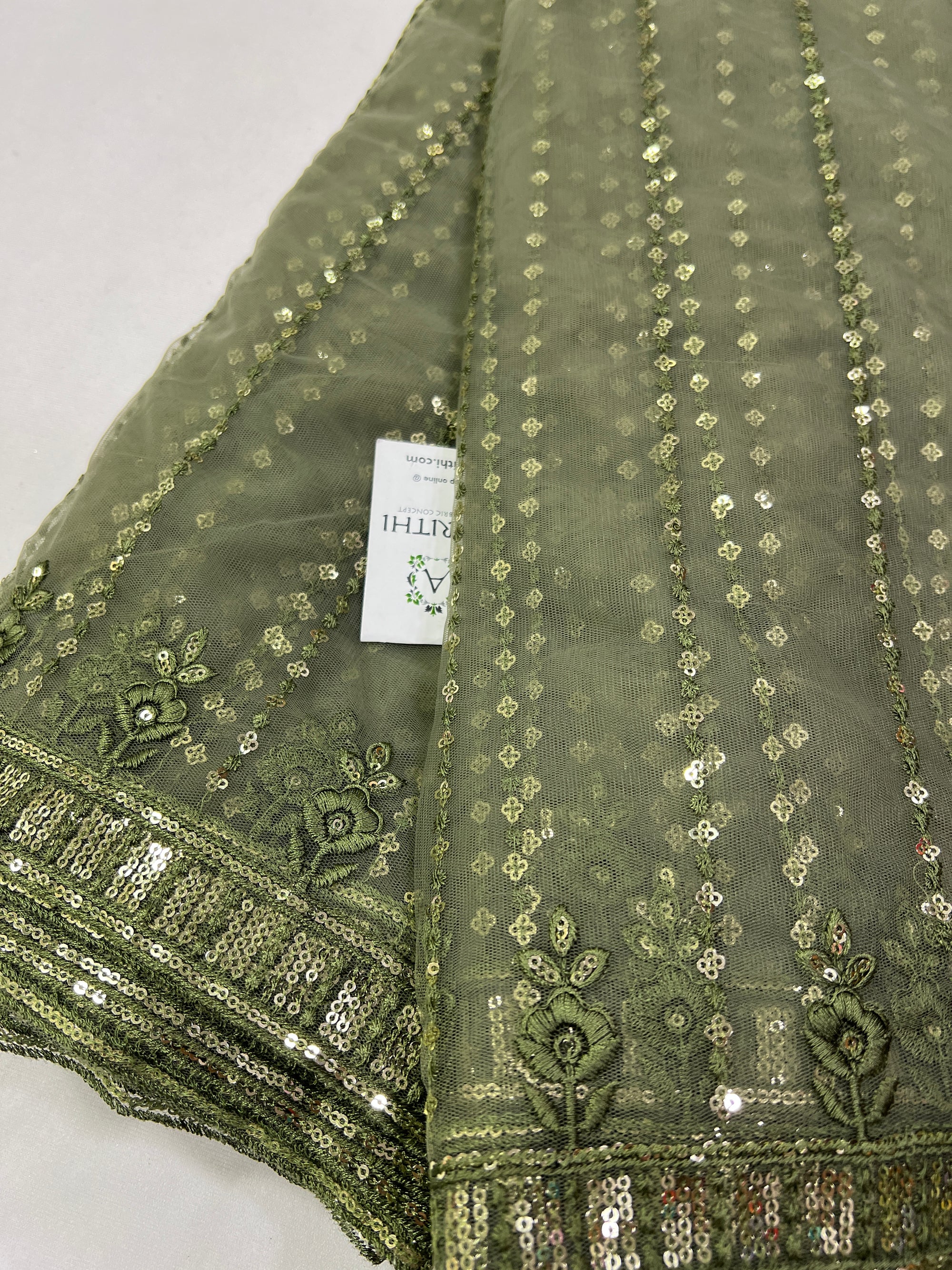 Embroidery on net fabric
