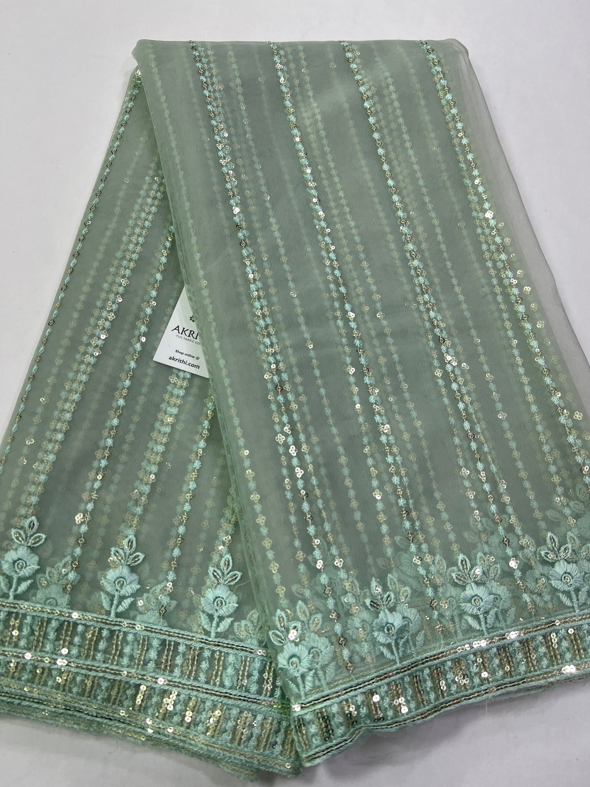 Embroidery on net fabric