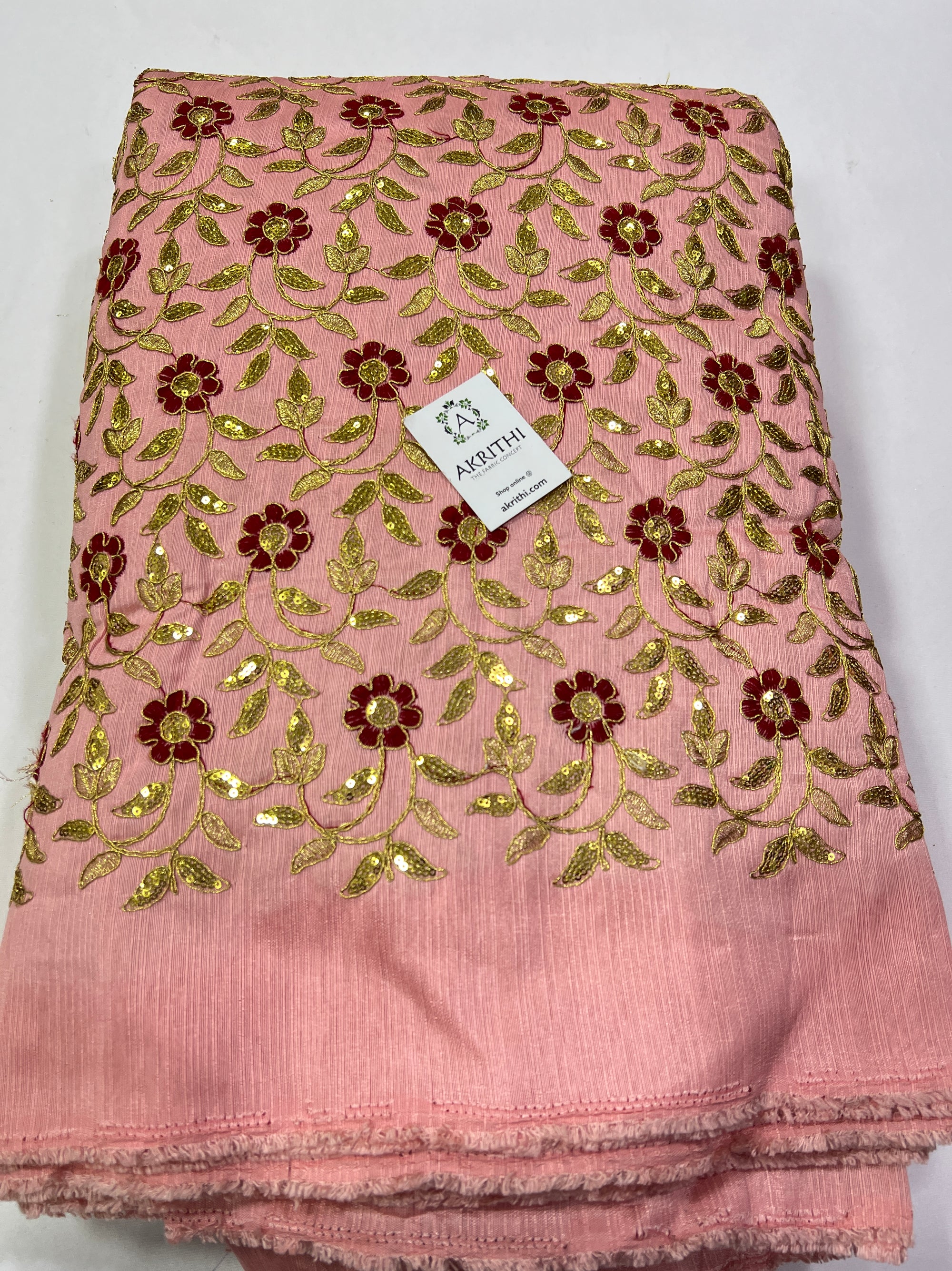 Embroidery on raw silk fabric