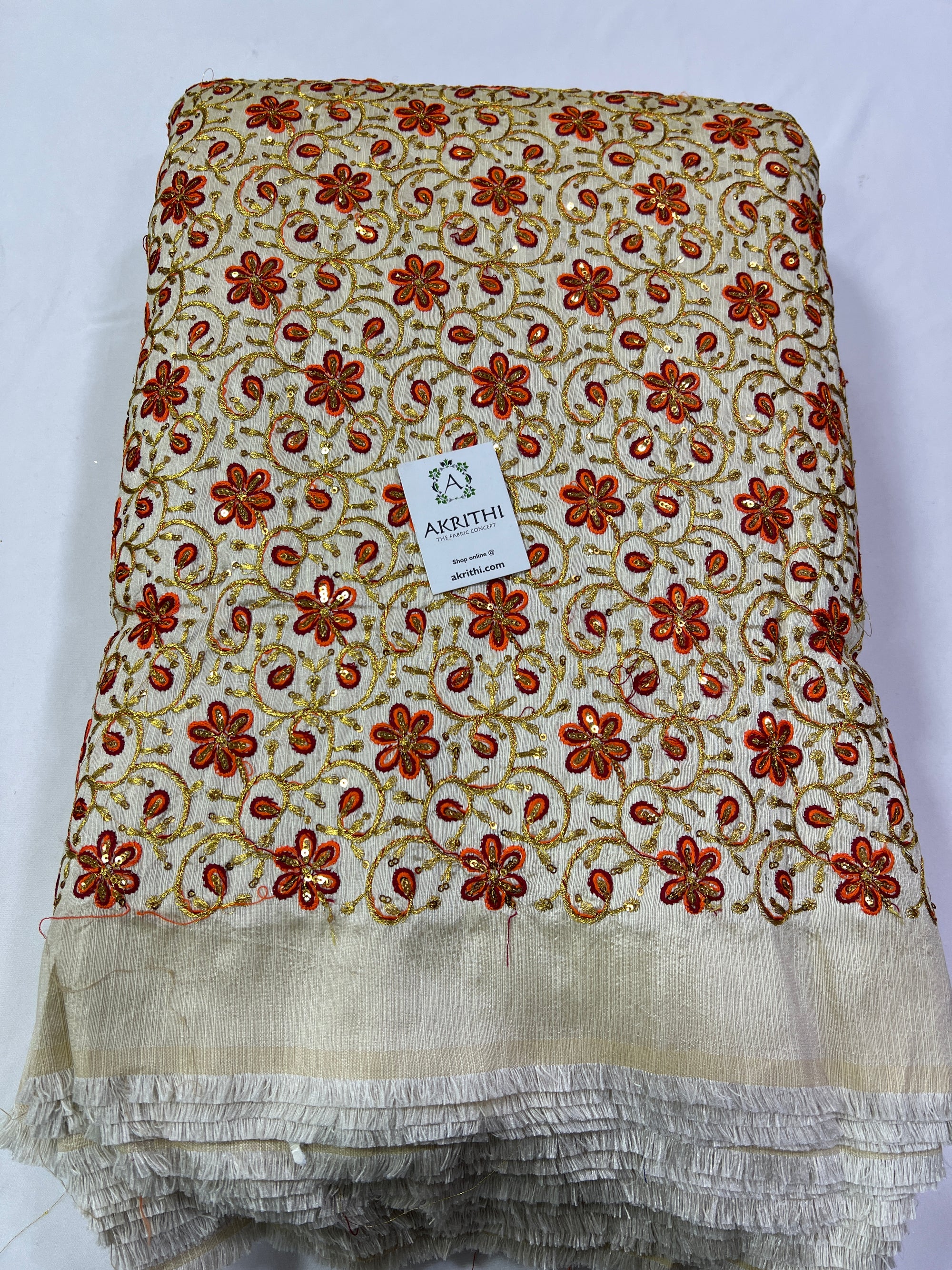 Embroidery on raw silk fabric