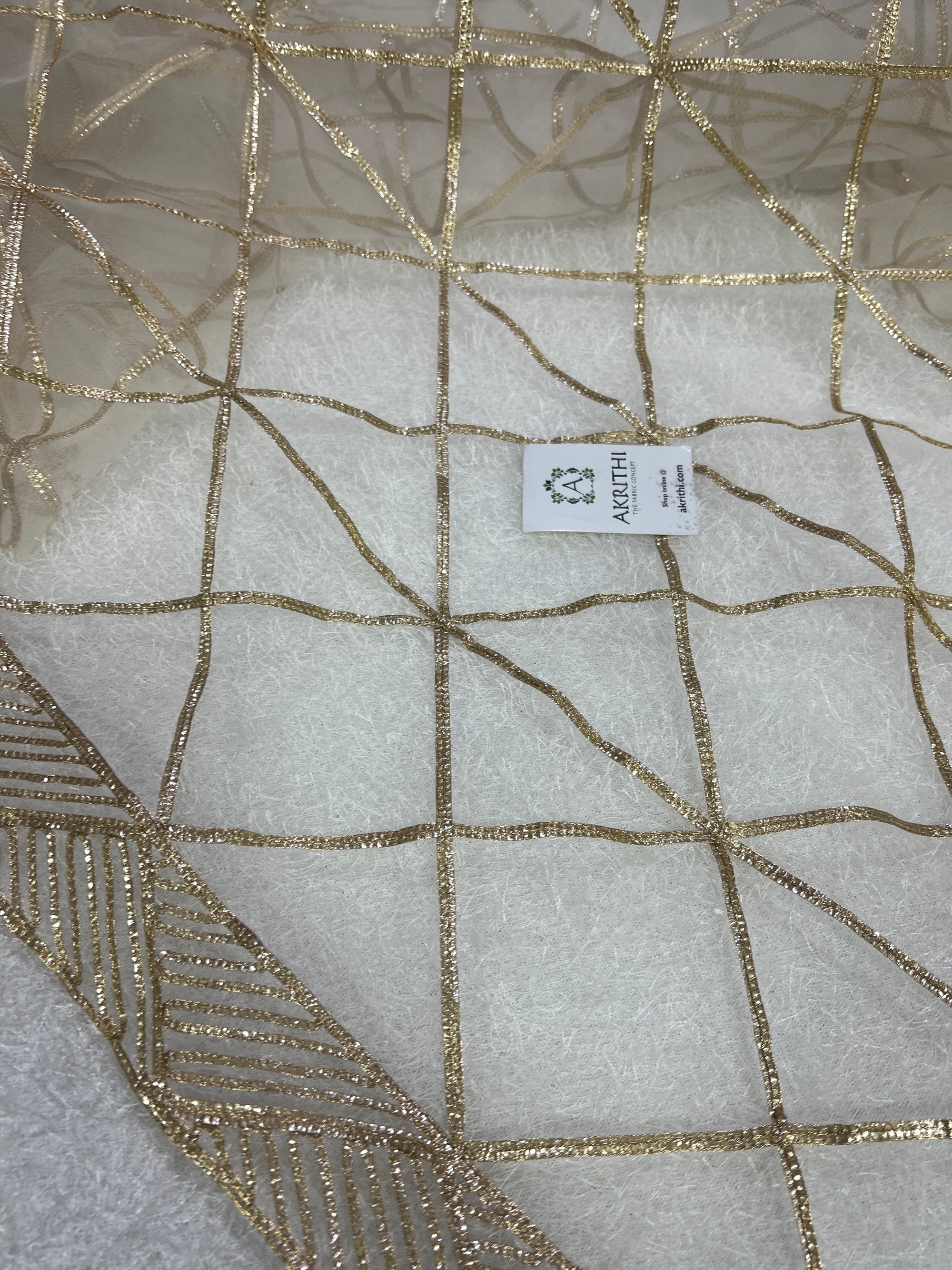 Embroidery on net fabric