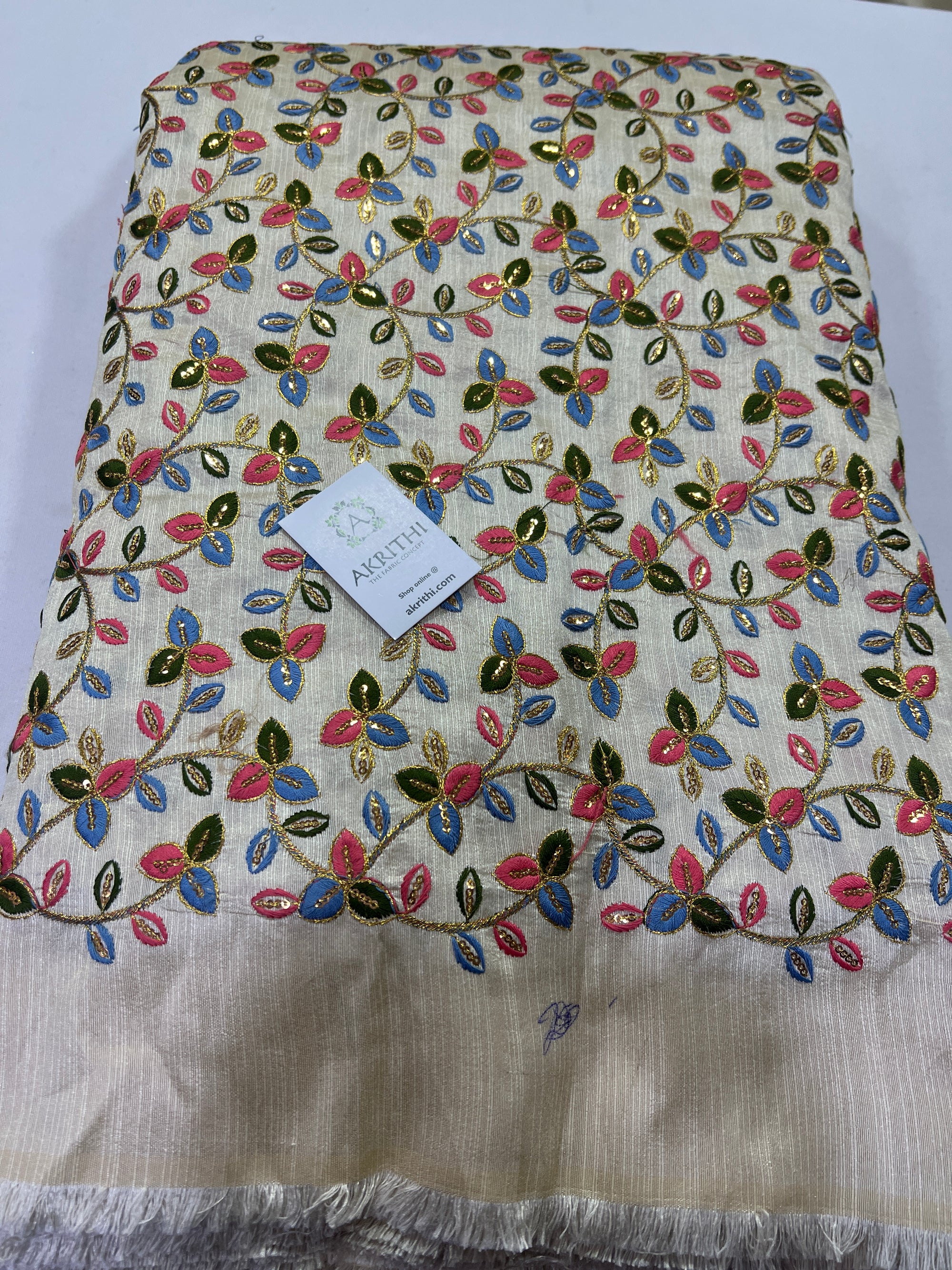 Embroidery on raw silk fabric 60 cms cut