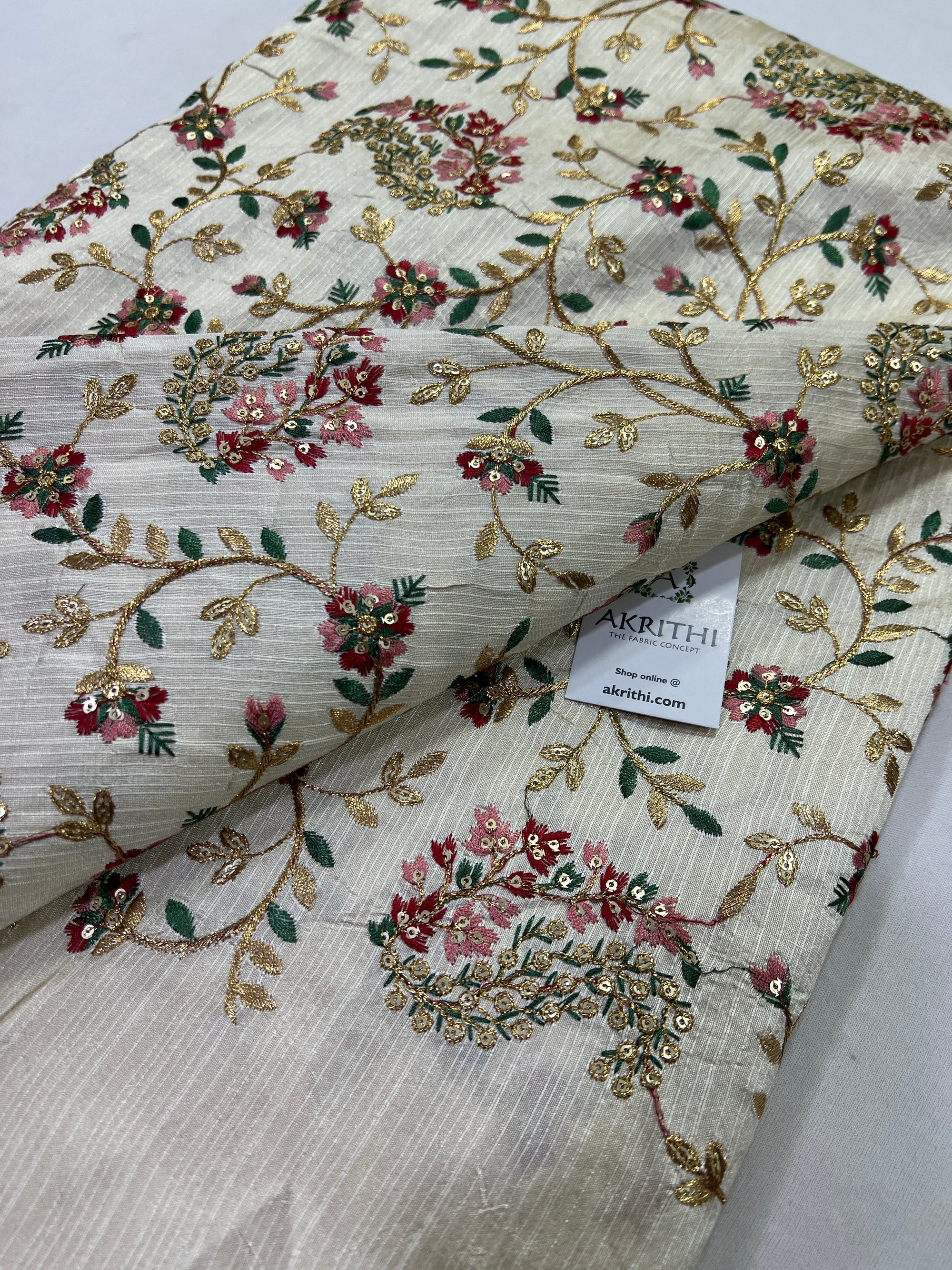Embroidery on raw silk fabric