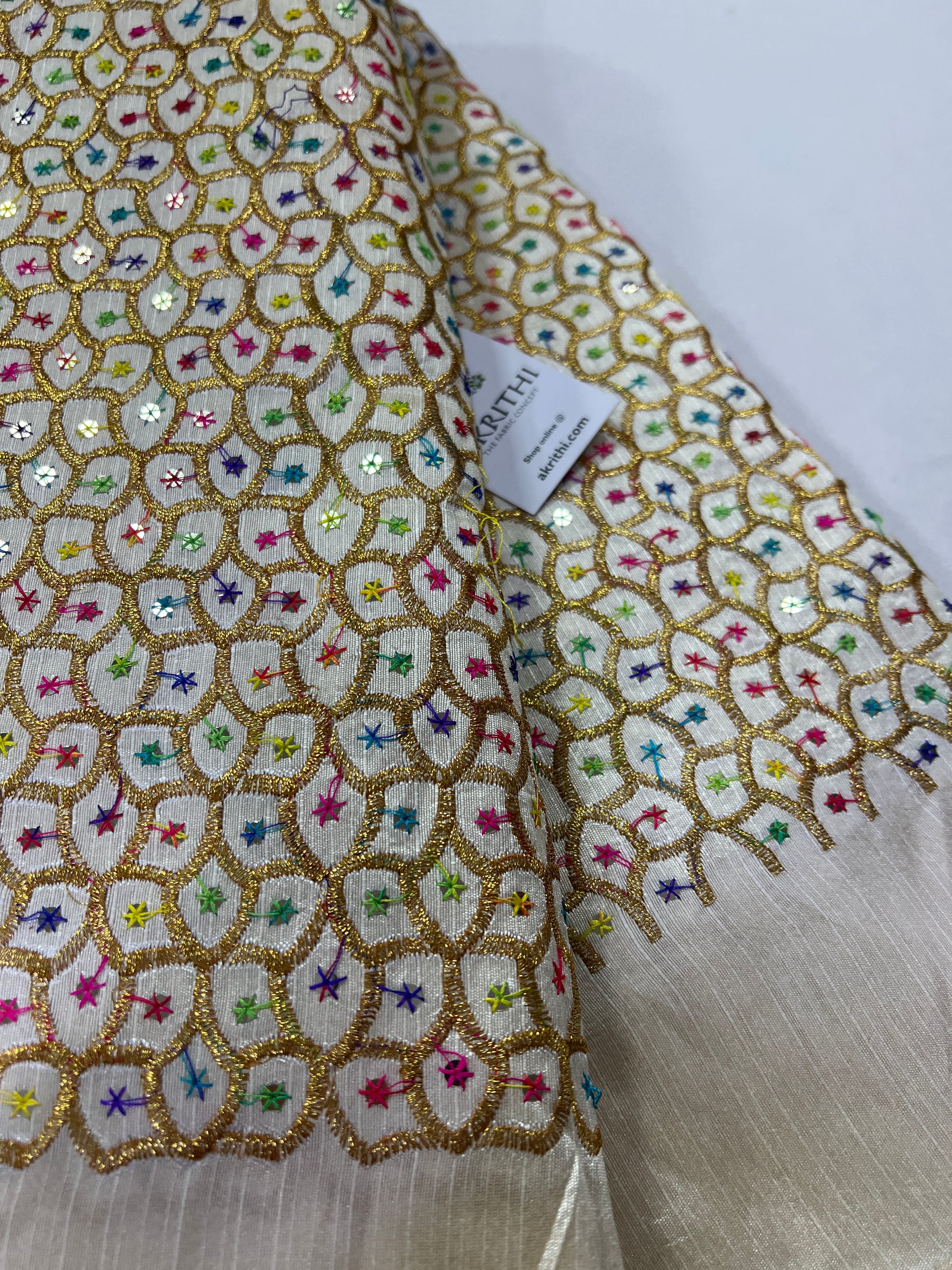 Embroidery on raw silk fabric