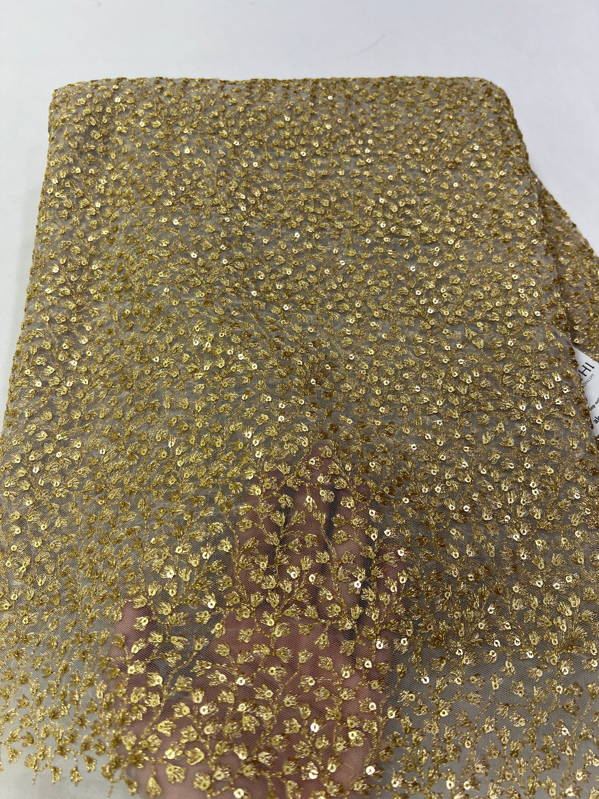 Gold Zari Embroidery on white net fabric