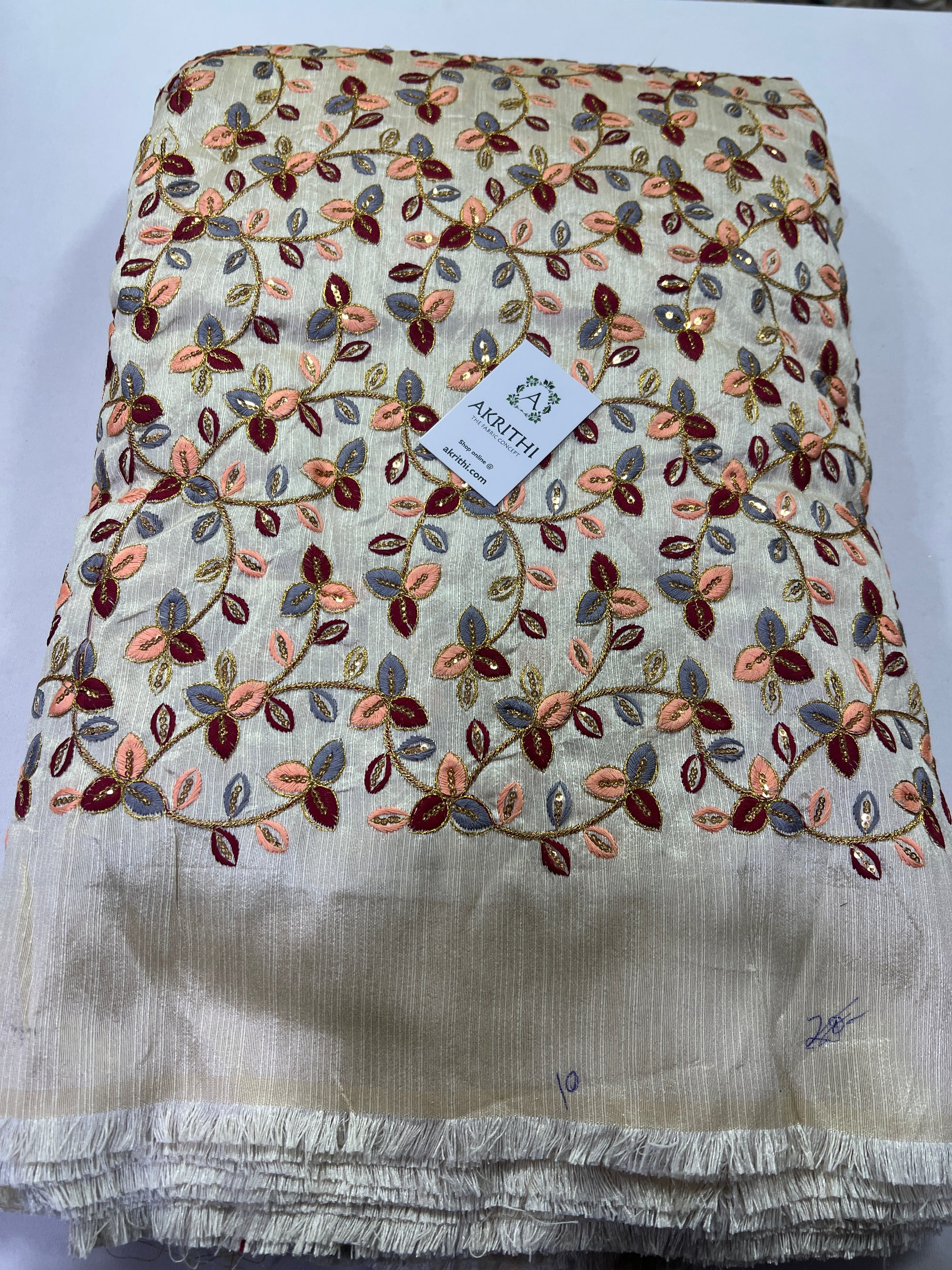 Embroidery on raw silk fabric