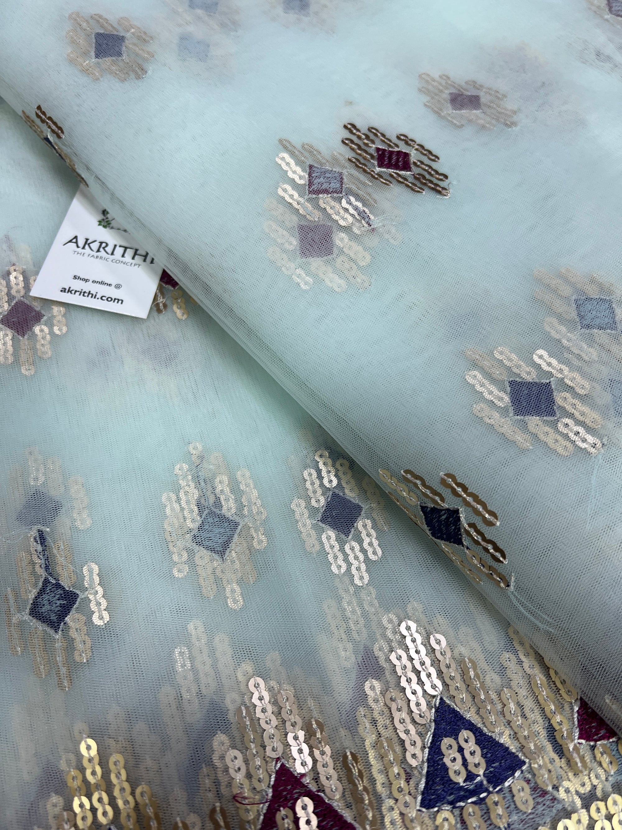 Embroidery on net fabric