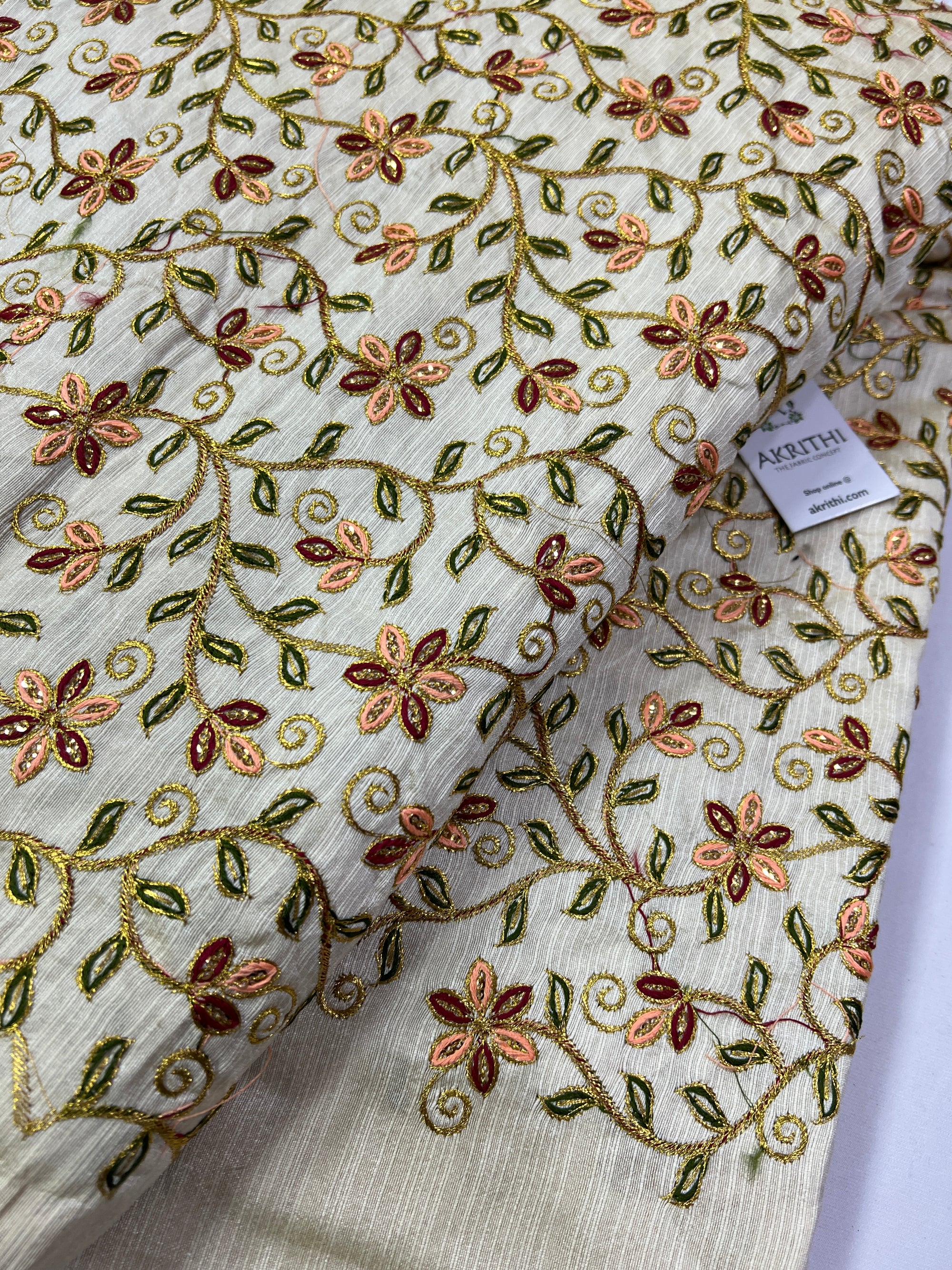 Embroidery on raw silk fabric