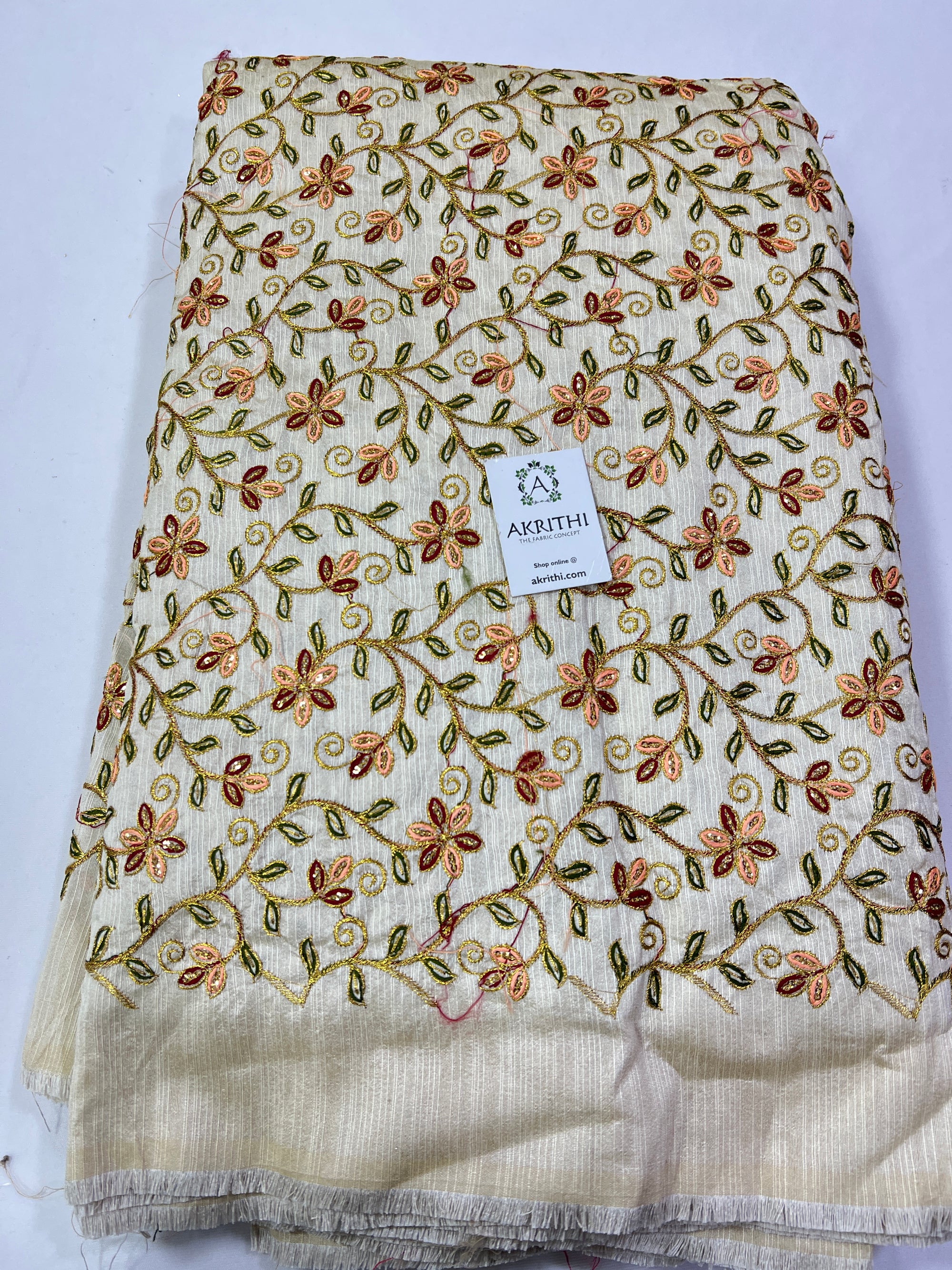 Embroidery on raw silk fabric