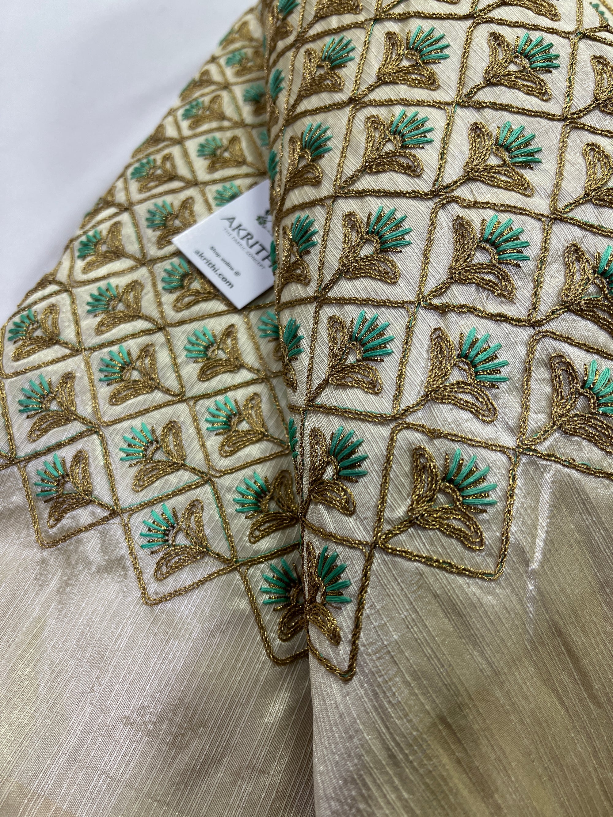 Embroidery on raw silk fabric