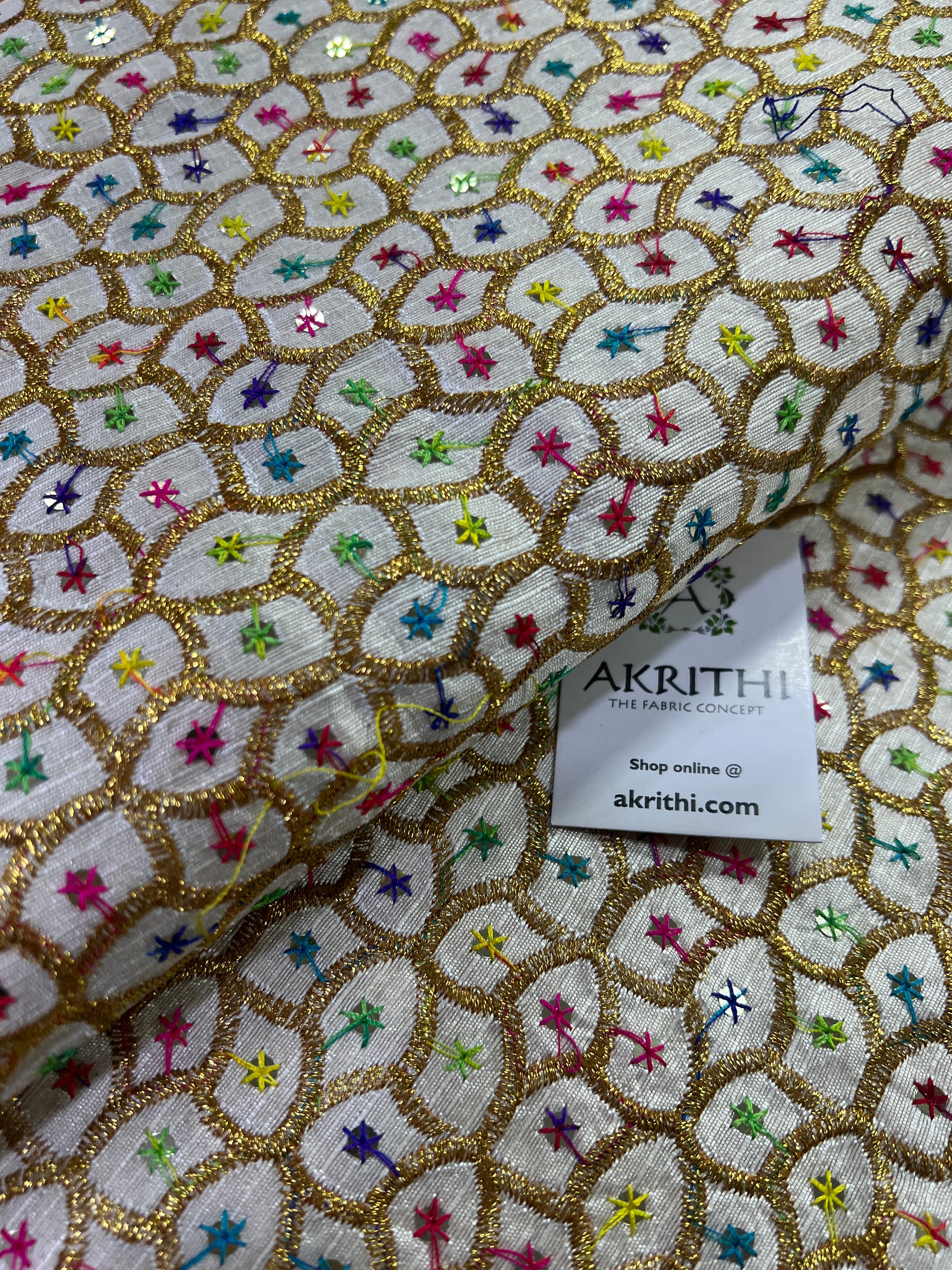 Embroidery on raw silk fabric