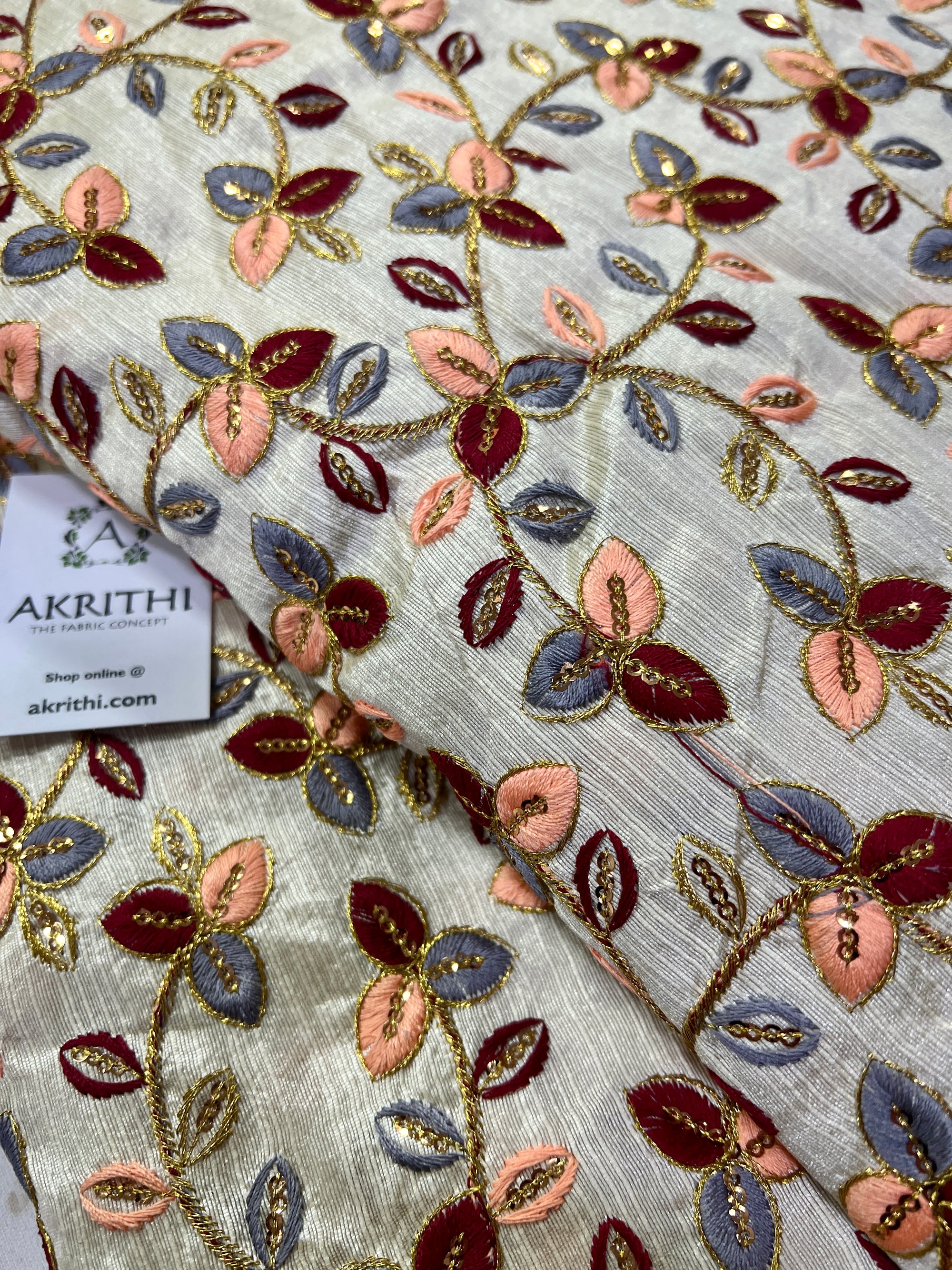 Embroidery on raw silk fabric