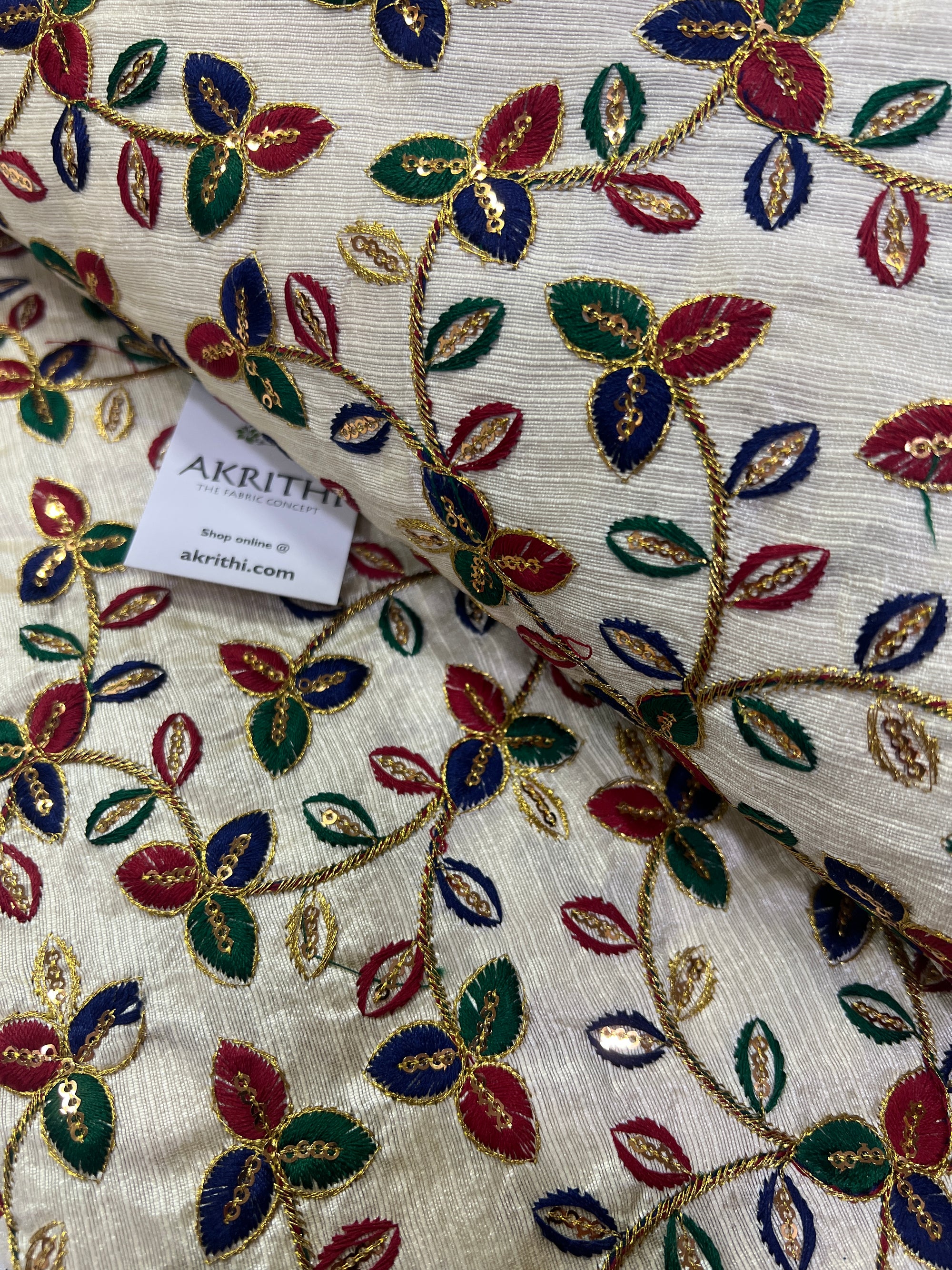 Embroidery on raw silk fabric
