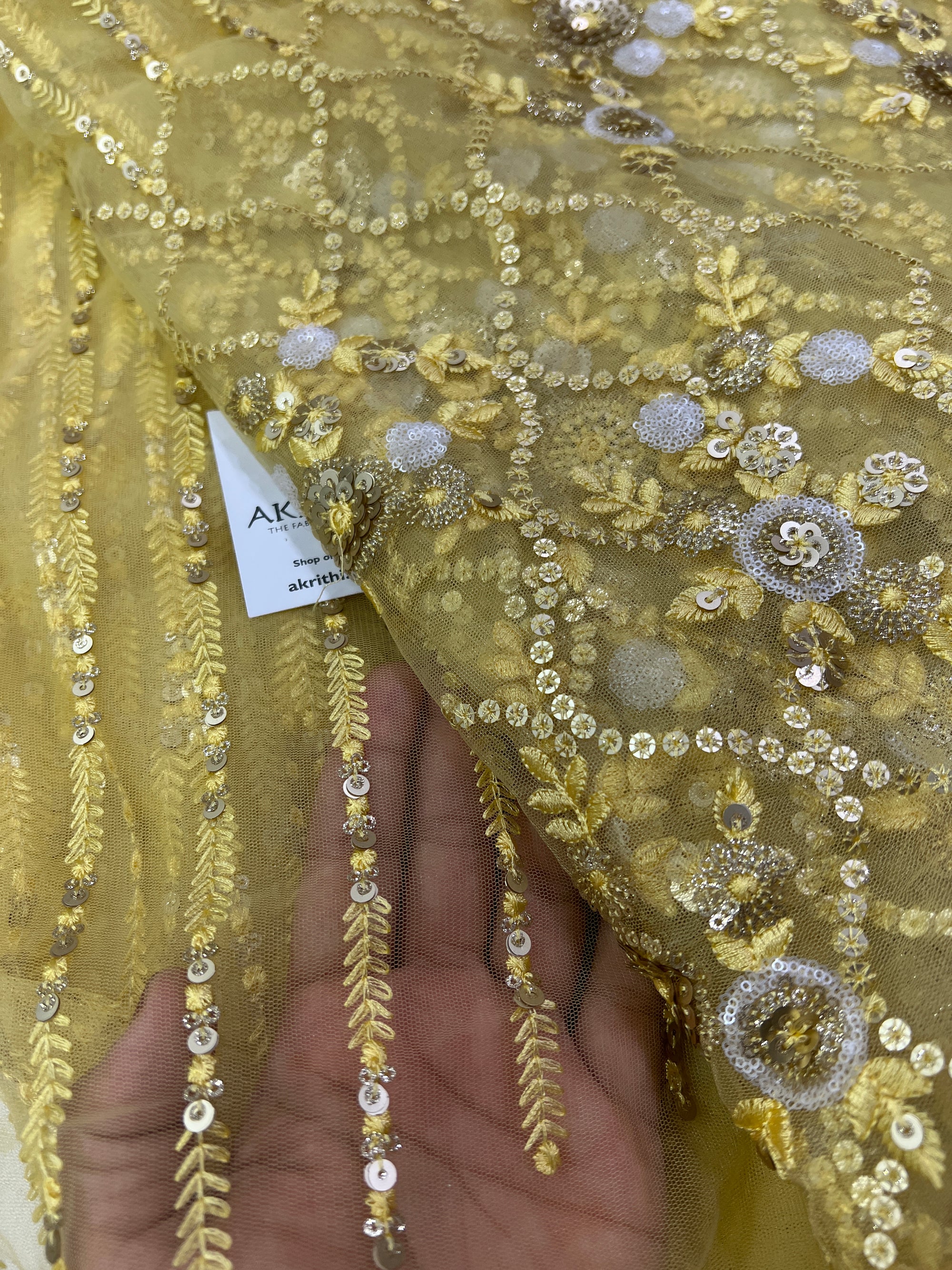 Embroidery on net fabric