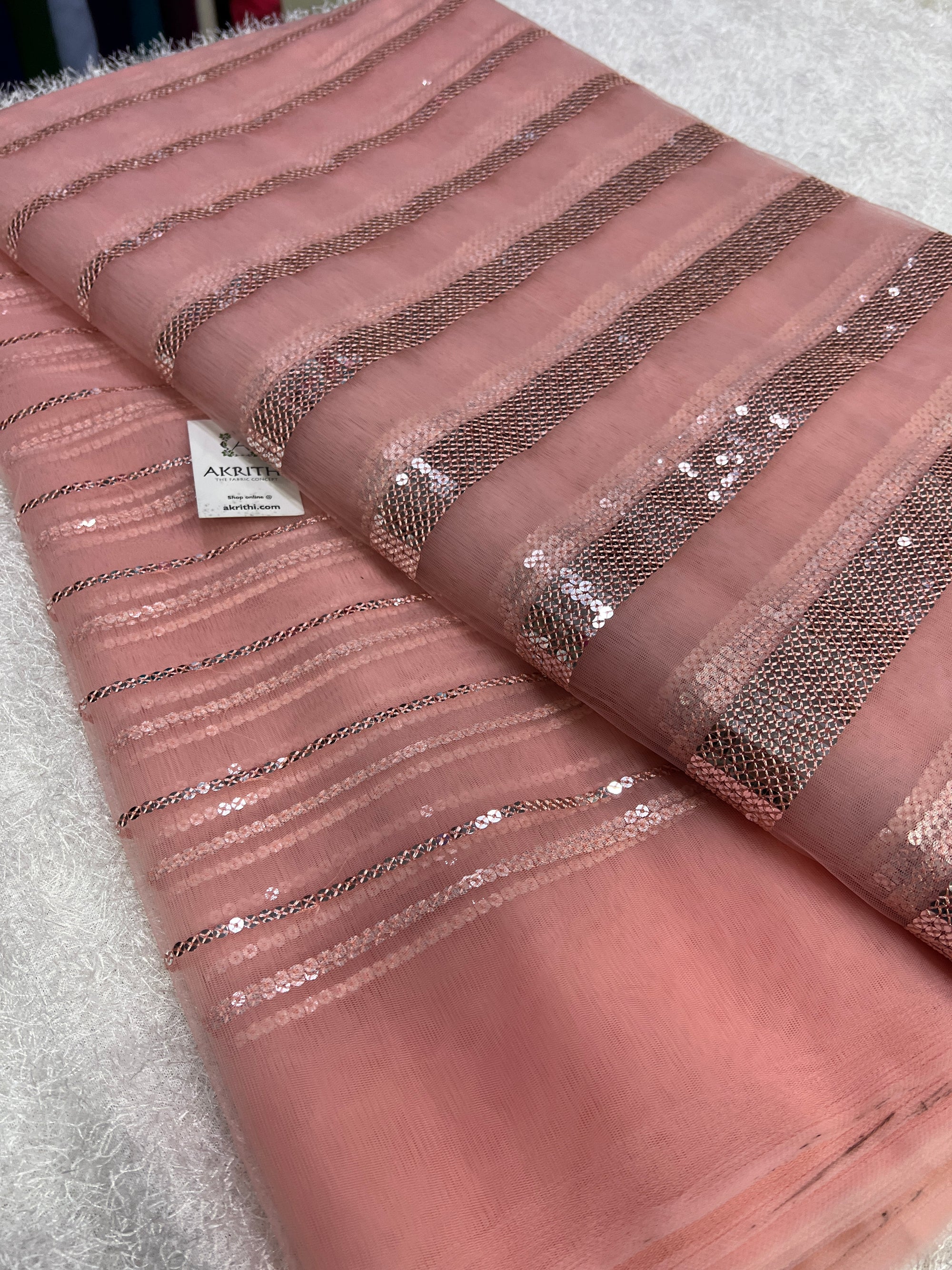 Embroidery on net fabric