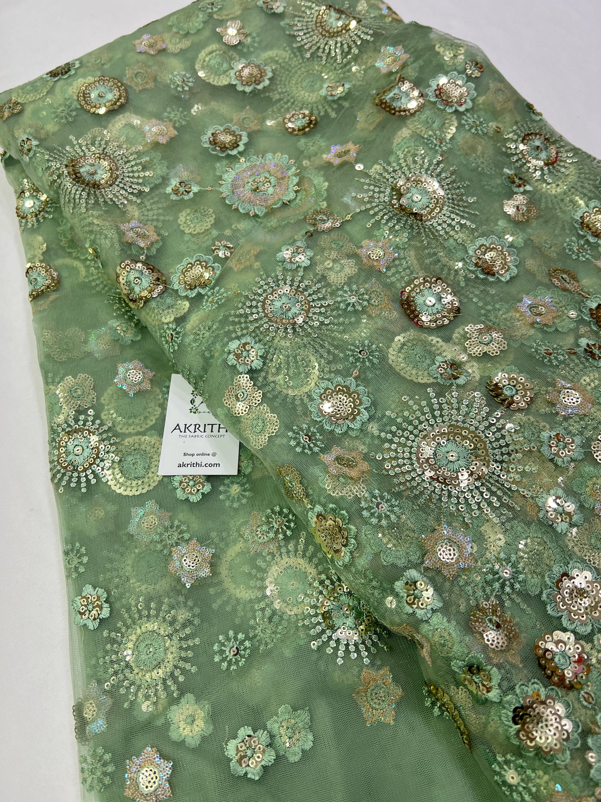 Embroidery on net fabric