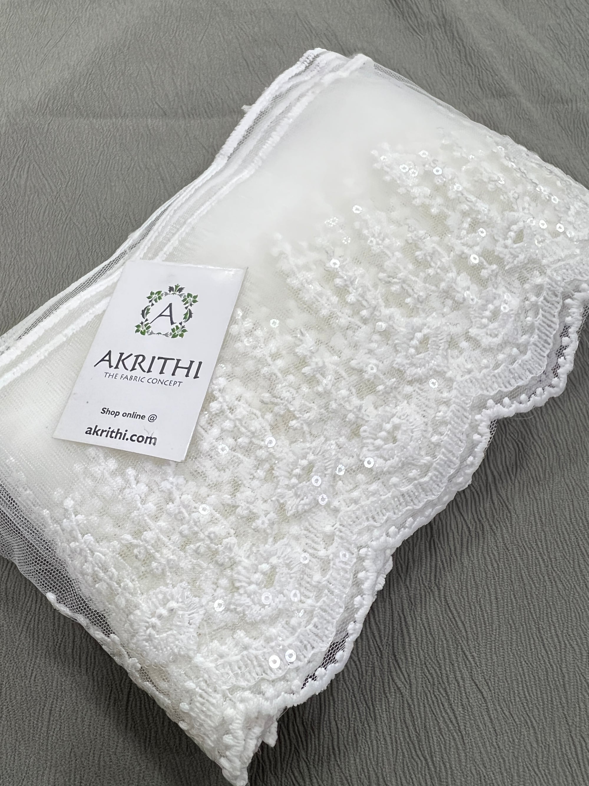 Embroidered white net lace 9 metres roll