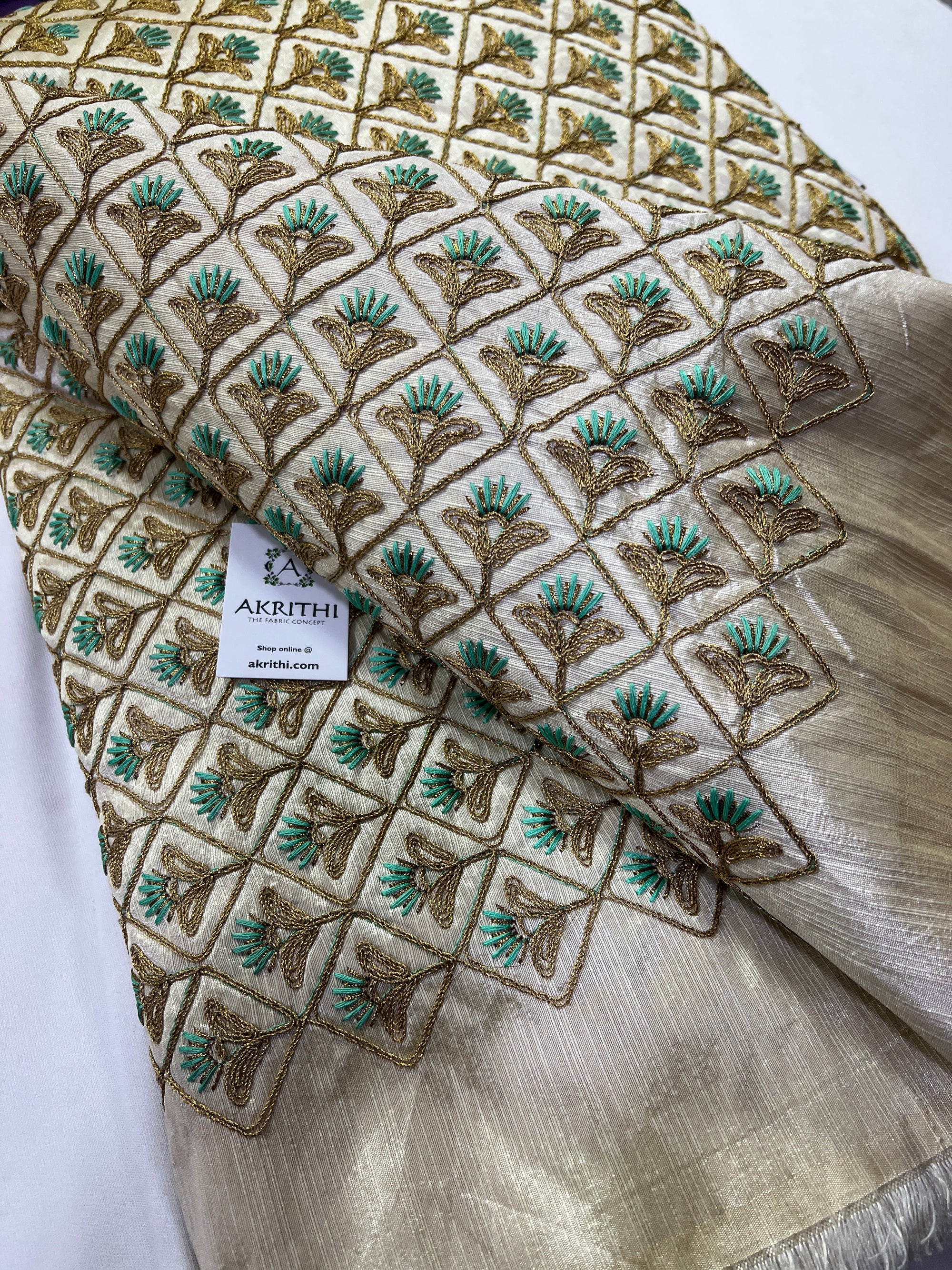 Embroidery on raw silk fabric