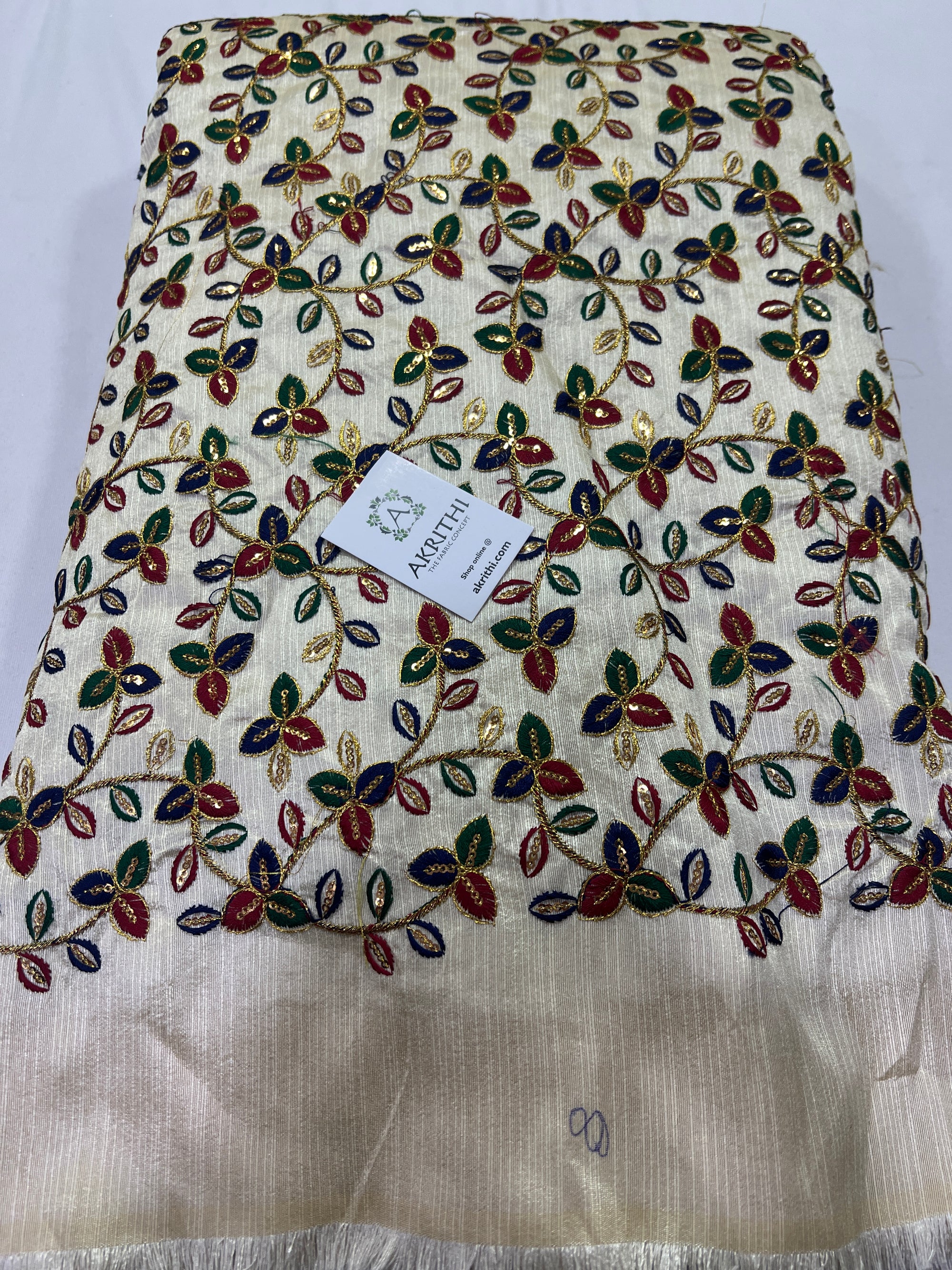 Embroidery on raw silk fabric