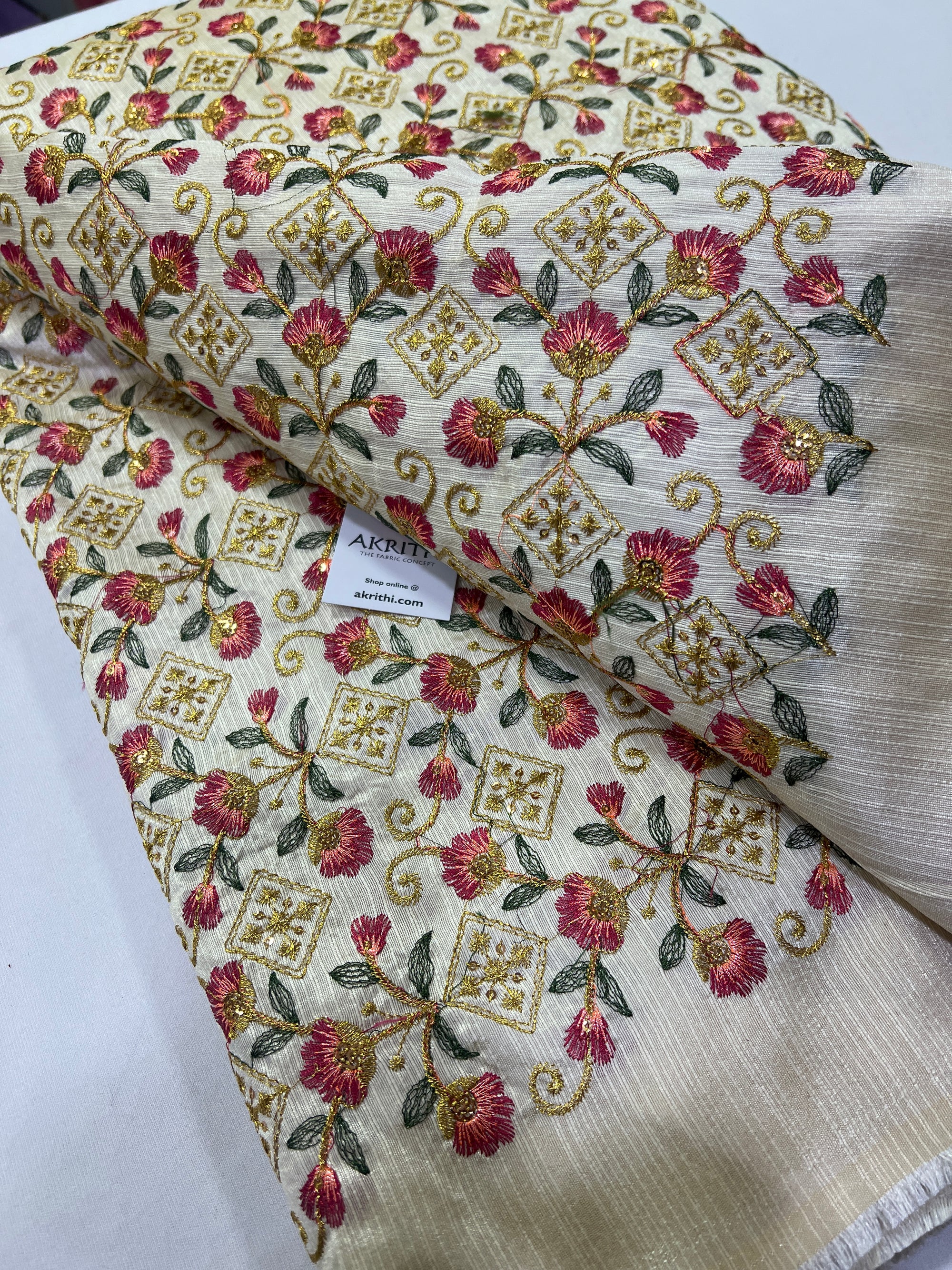 Embroidery on raw silk fabric
