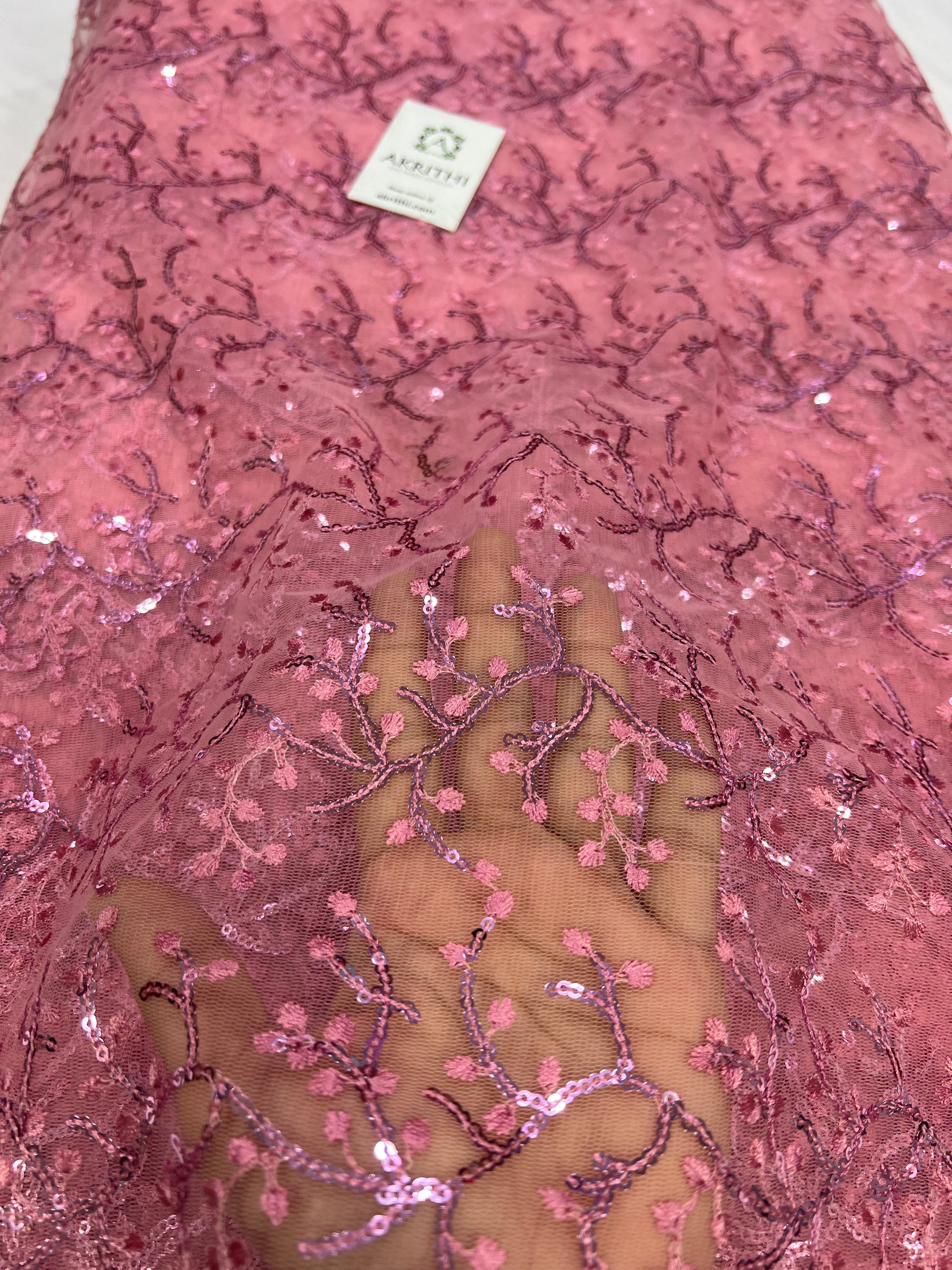 Embroidery on net fabric