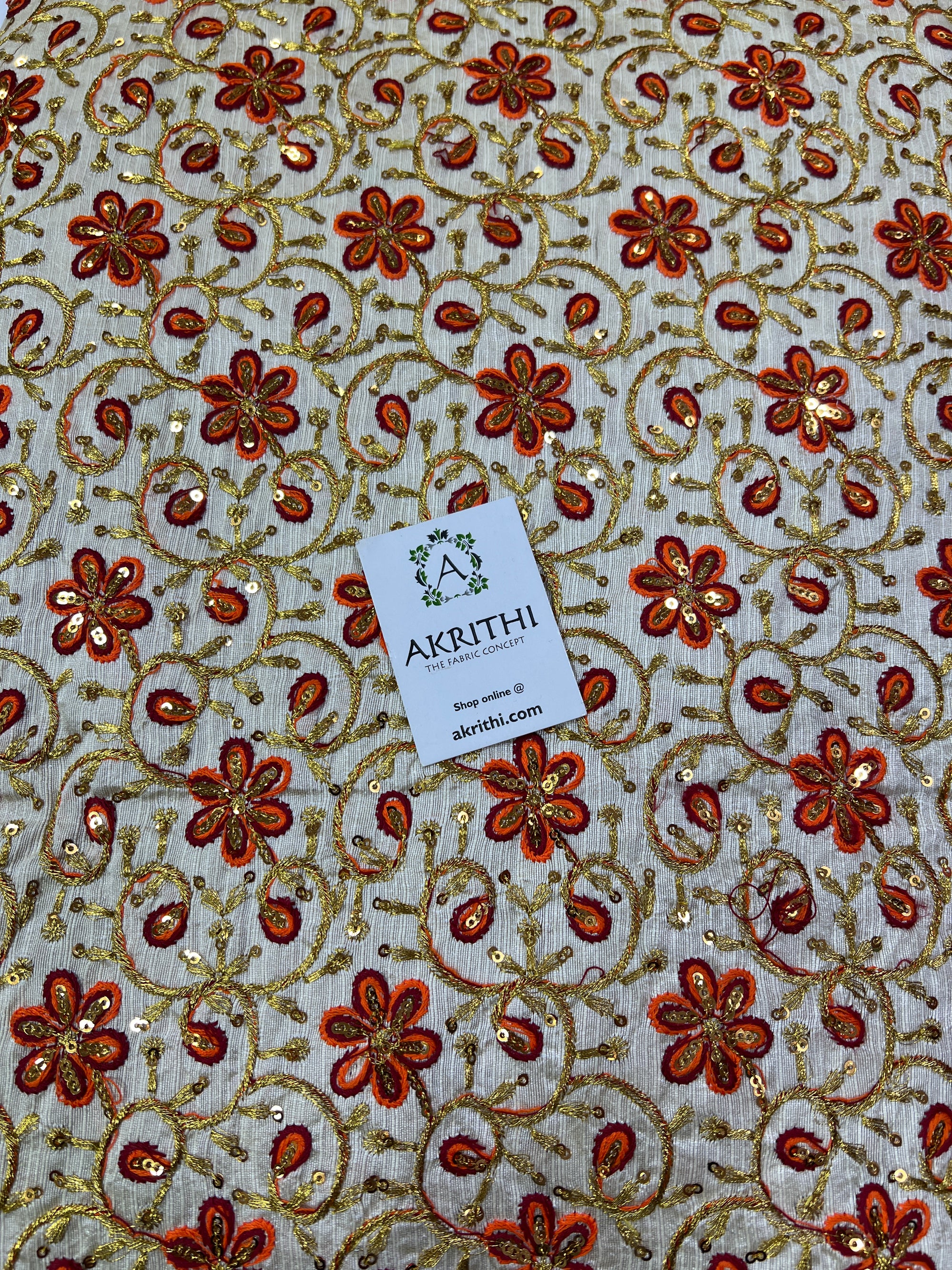 Embroidery on raw silk fabric
