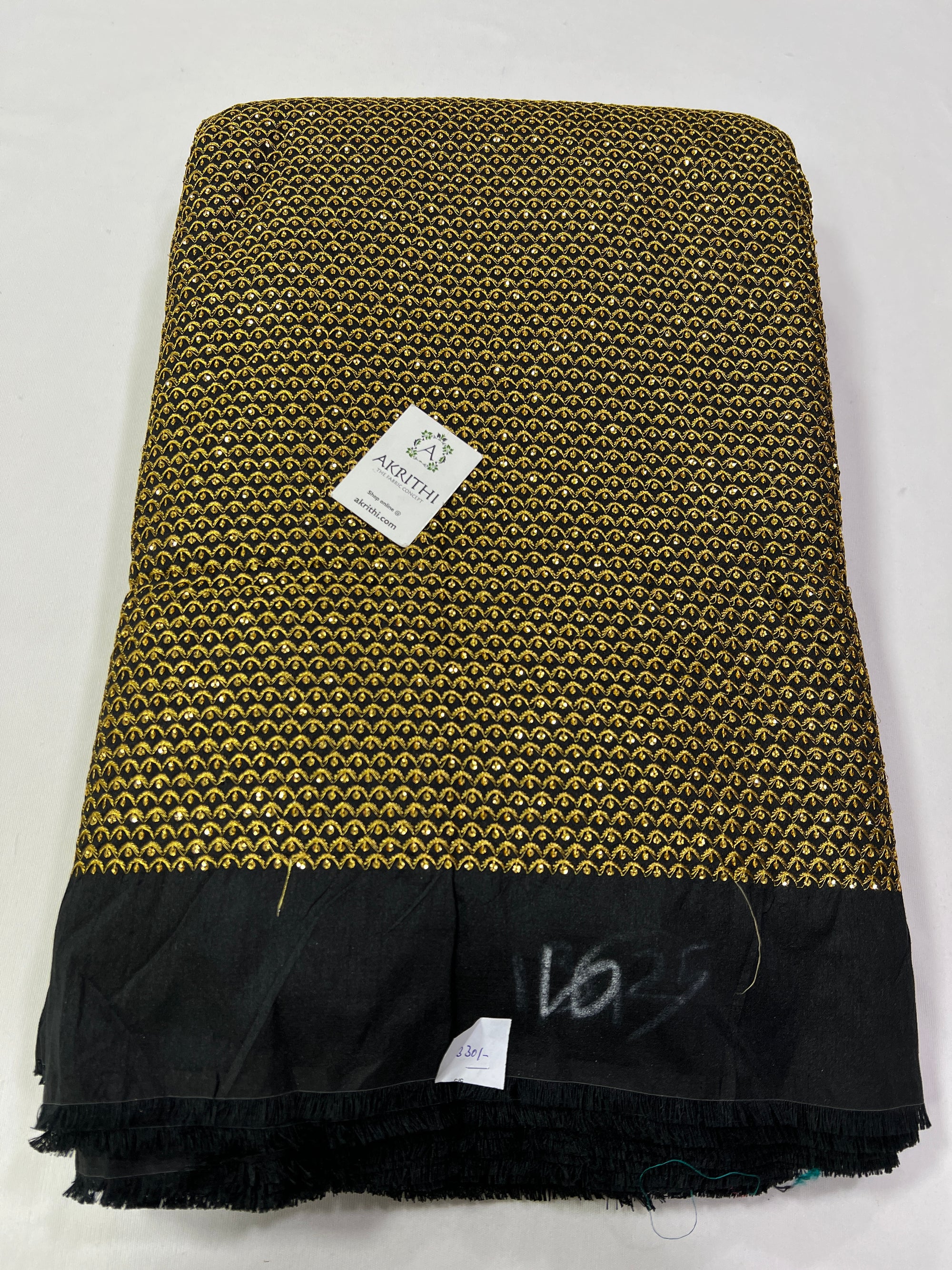 Embroidery on raw silk fabric