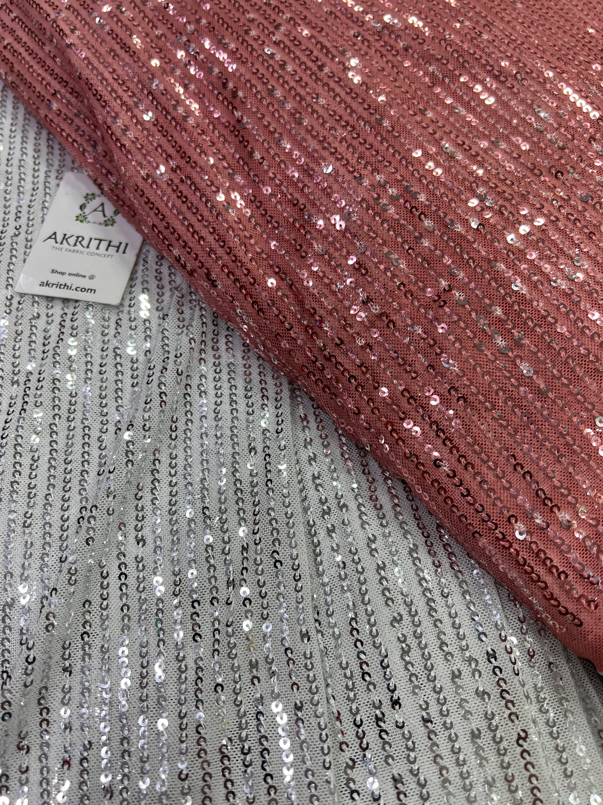Sequins on shaded net fabric