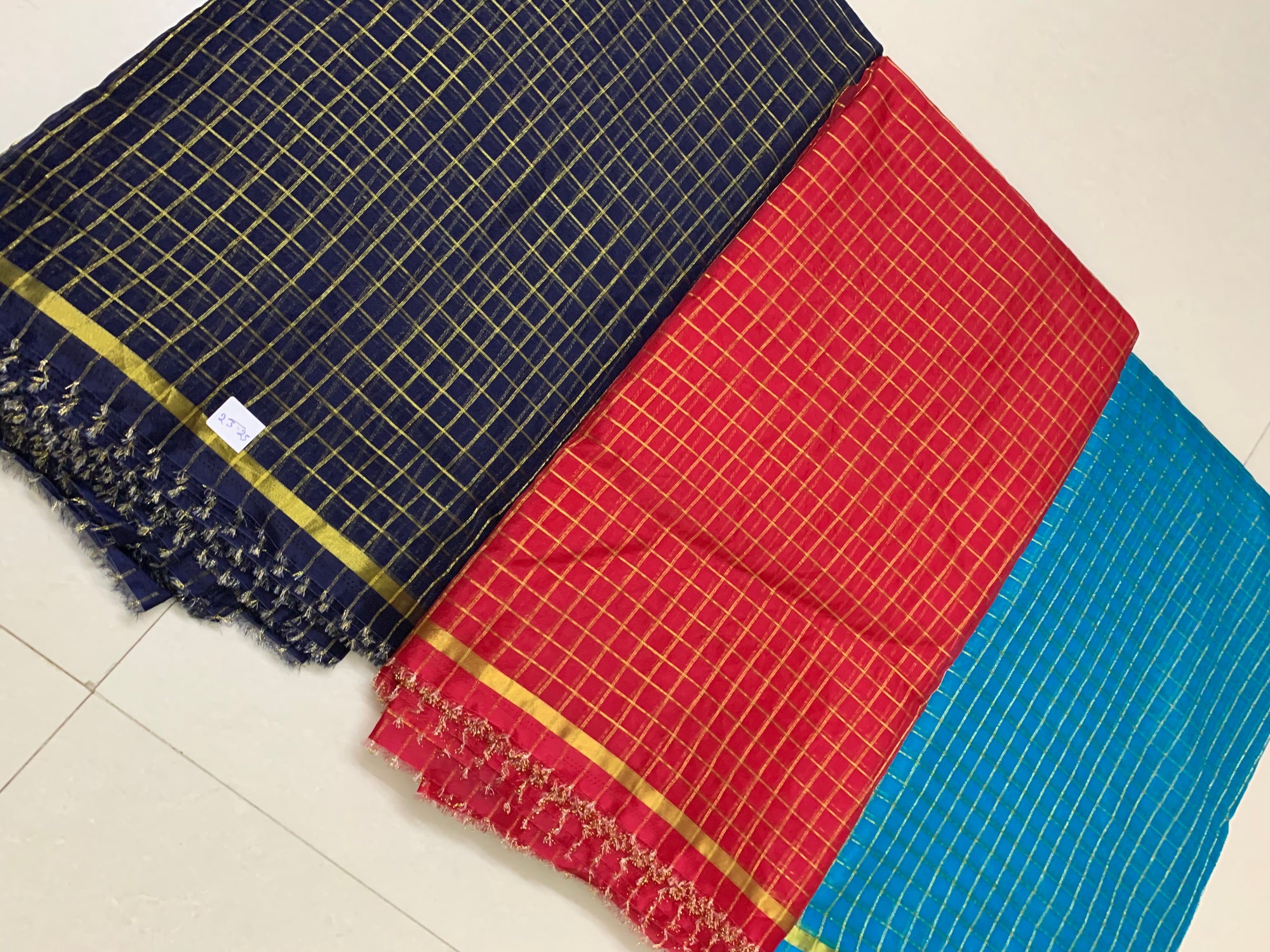 Zari checks organza fabric