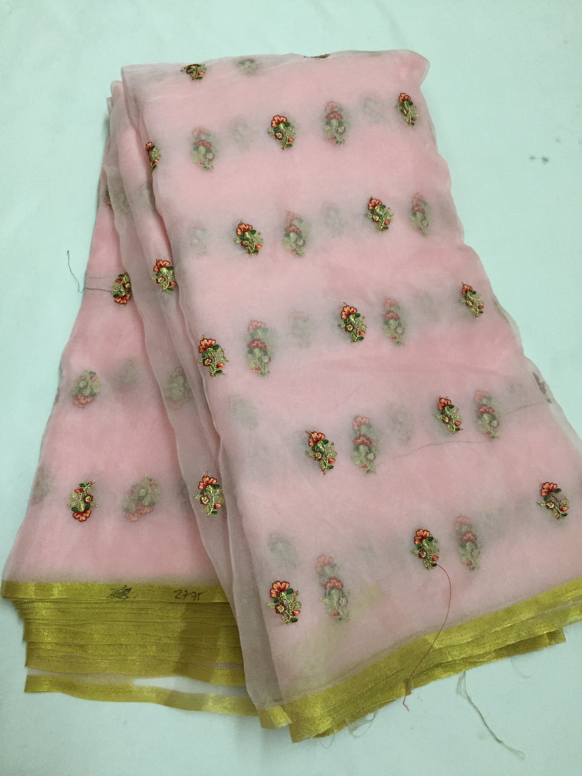 Embroidery on organza with zari border saree