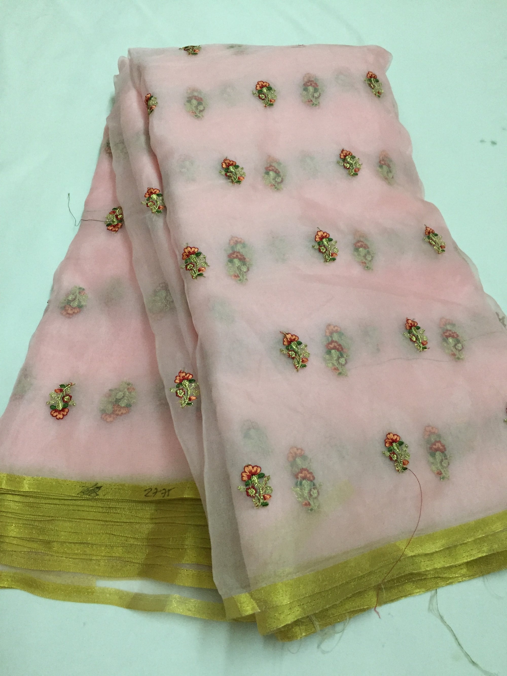 Embroidery on organza with zari border saree