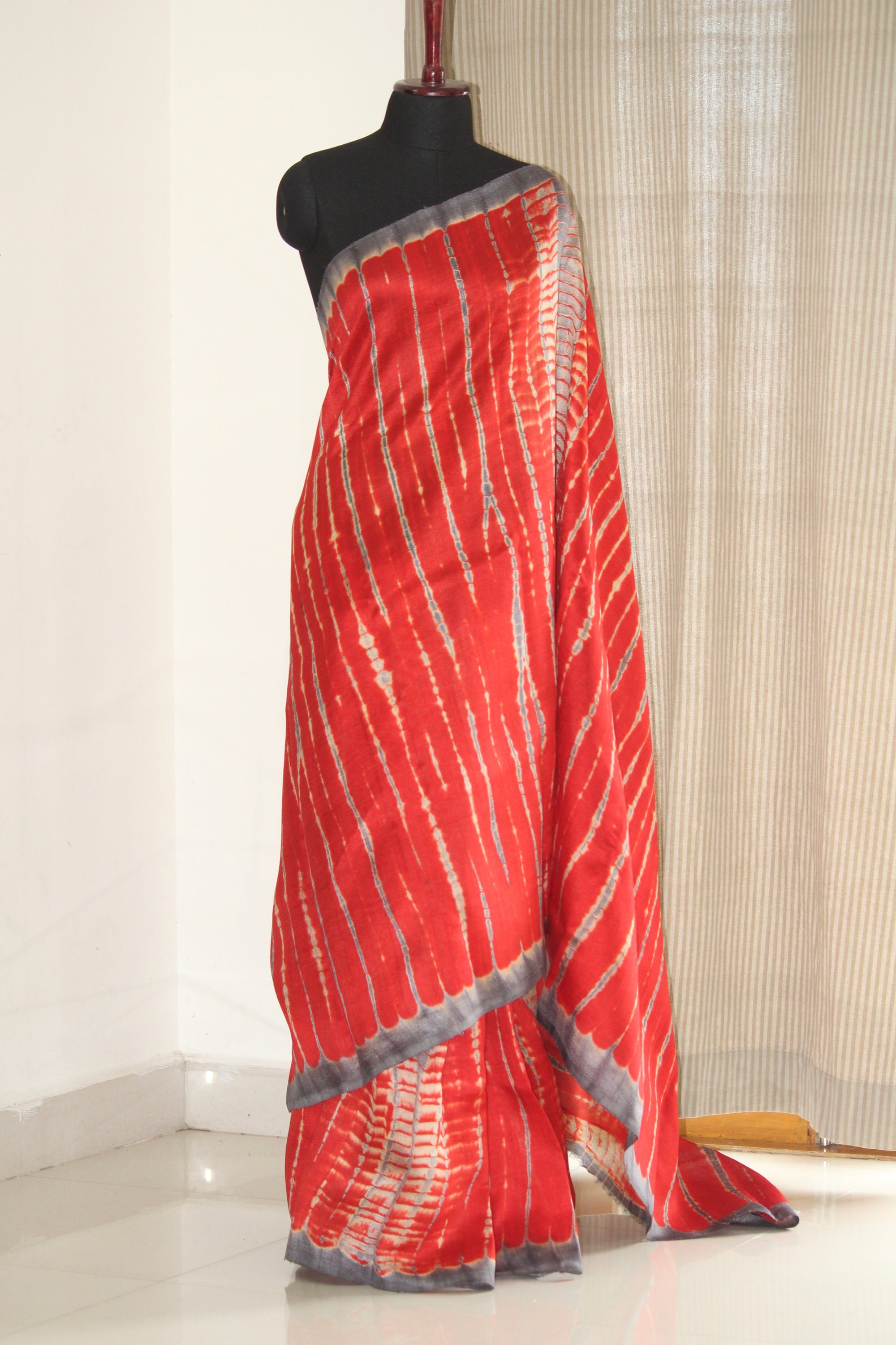Tie and dye pure raw silk saree